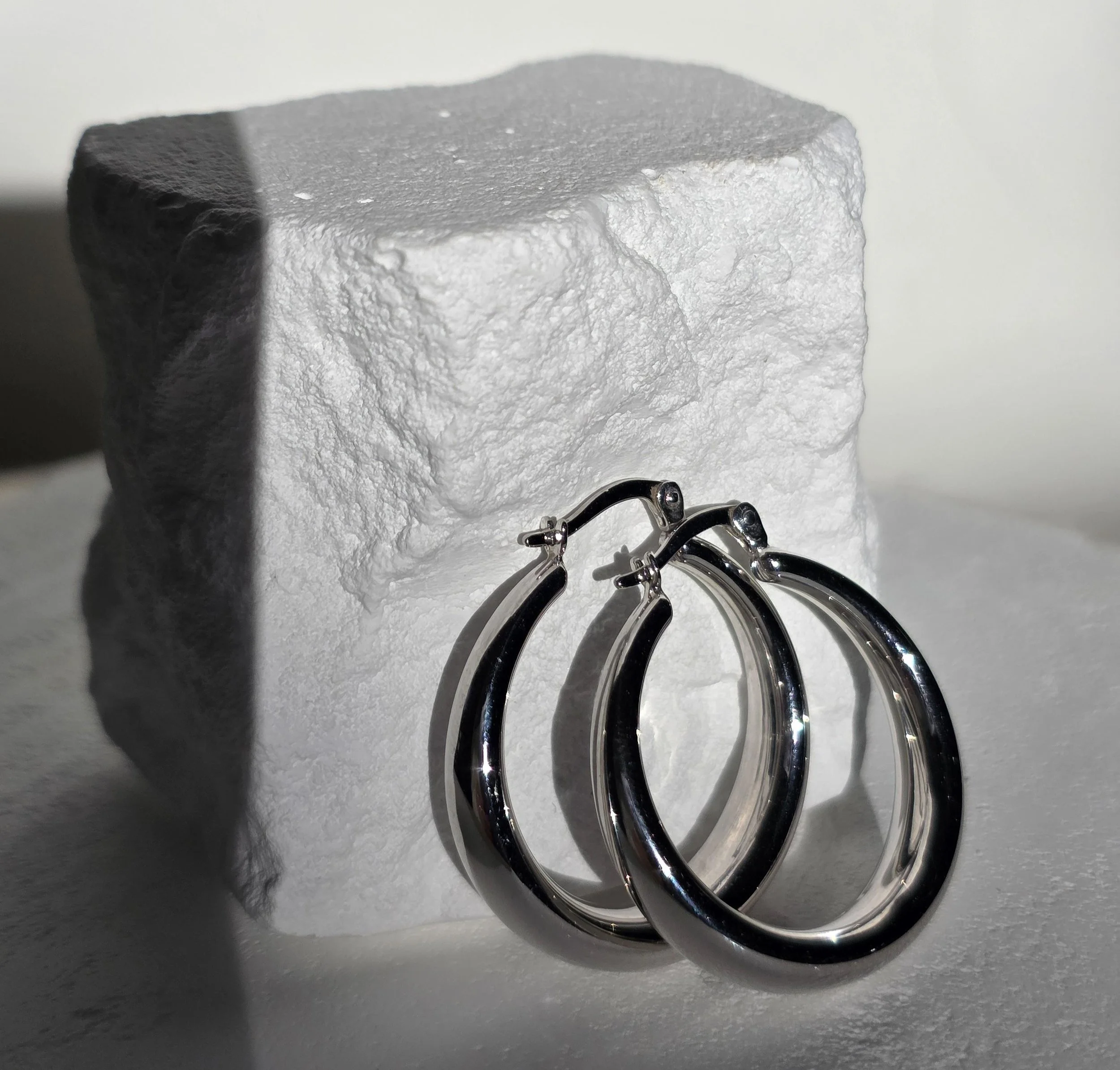 White Gold Tapered Hoop Earrings