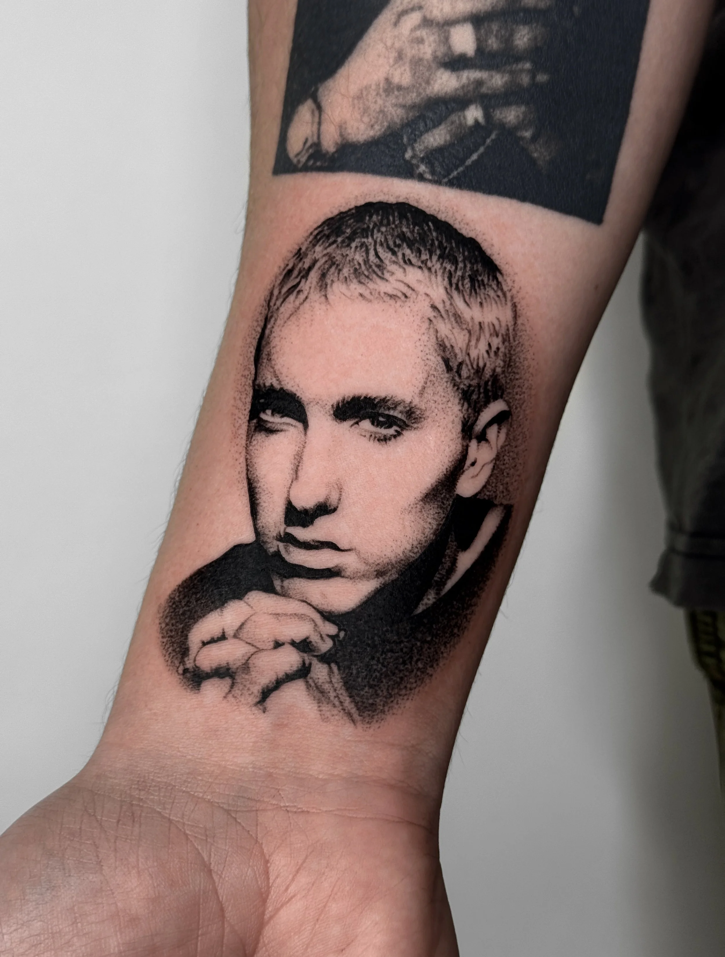 Eminem portrait for Adam, tucked below an almost four year healed Tupac Portrait! 💘
.
.
.
.
#portraittattoo #dotworkportrait #eminemtattoo #melbournetattooartist #stippletattoo