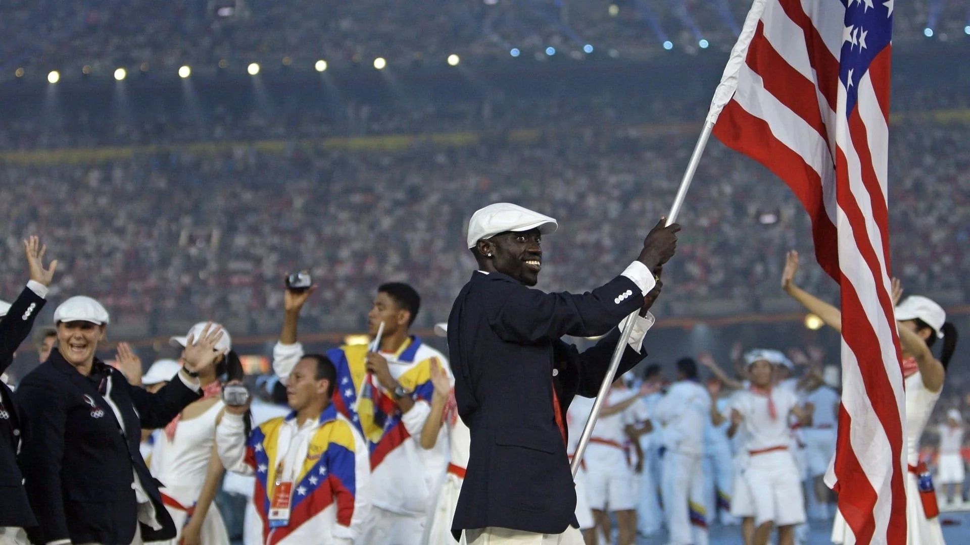An athlete carrying the flag of United States at the opening ceremony of the 2008 Olympic Games