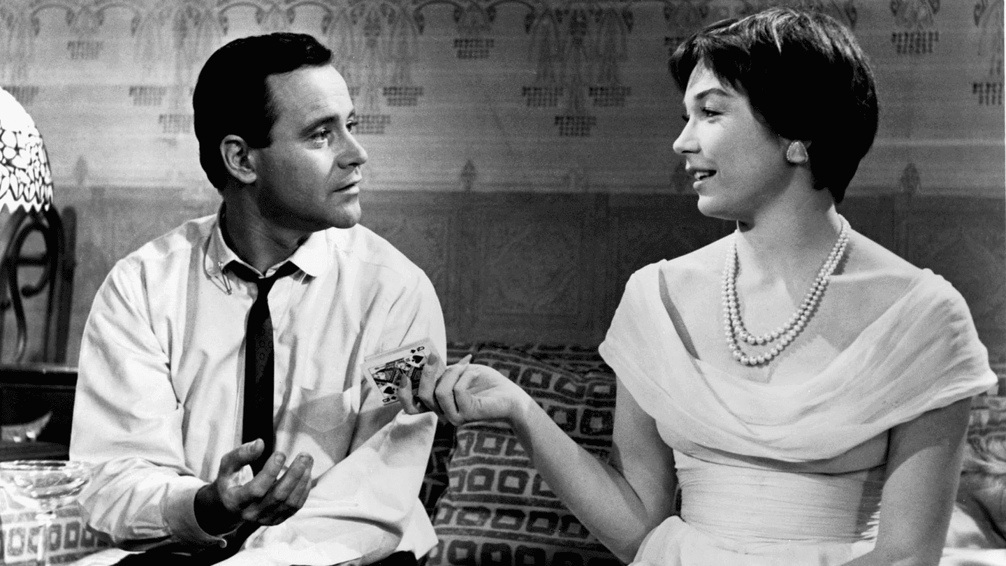 A man and a woman play cards