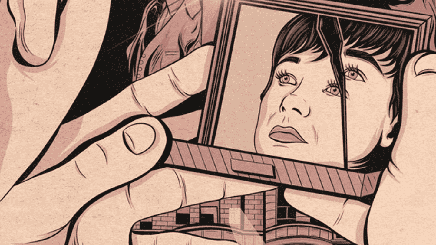 A woman looks at her reflection in a mirror