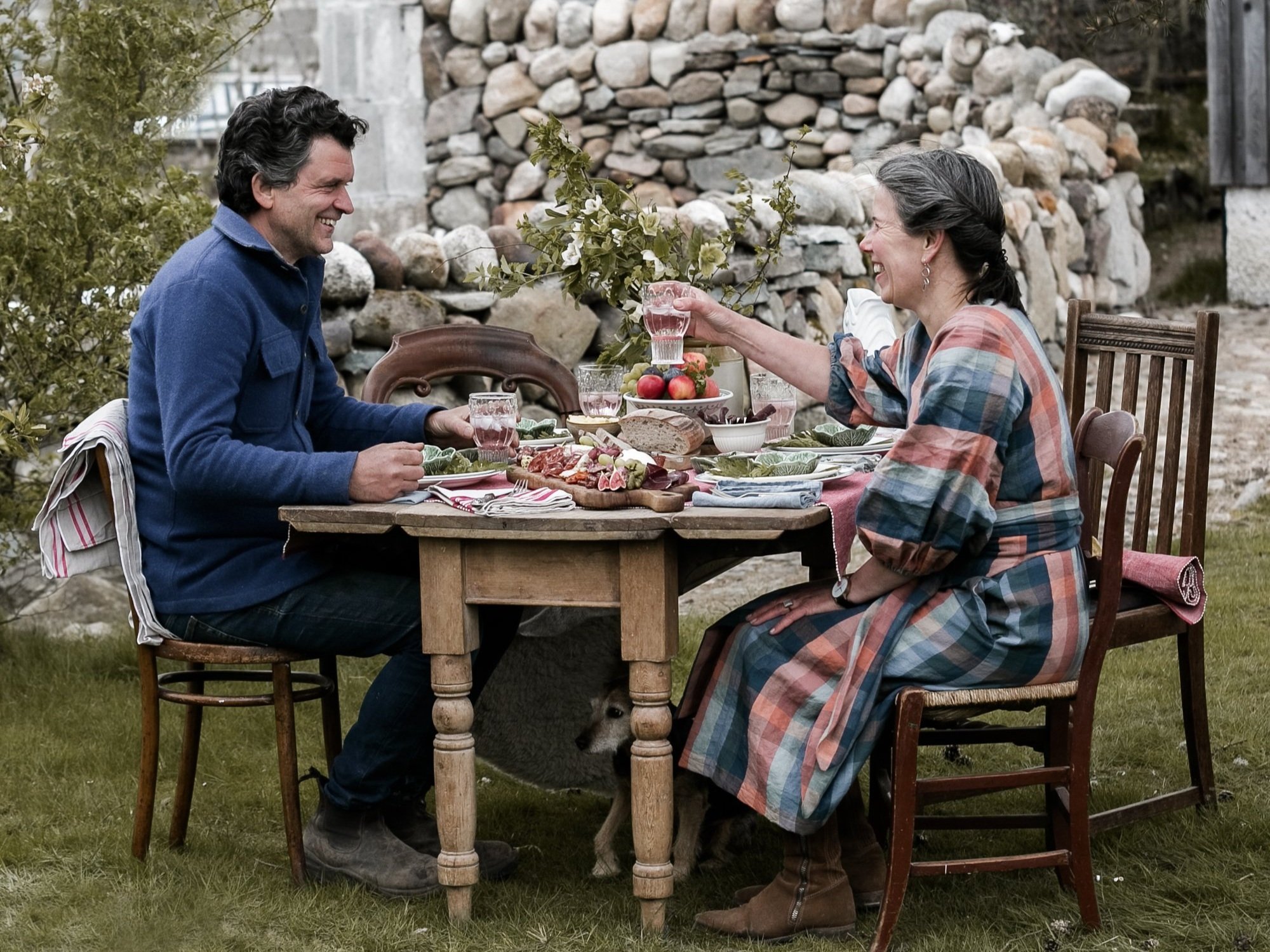 anja baak and jan jakob of great glen charcuterie dining outside in garden