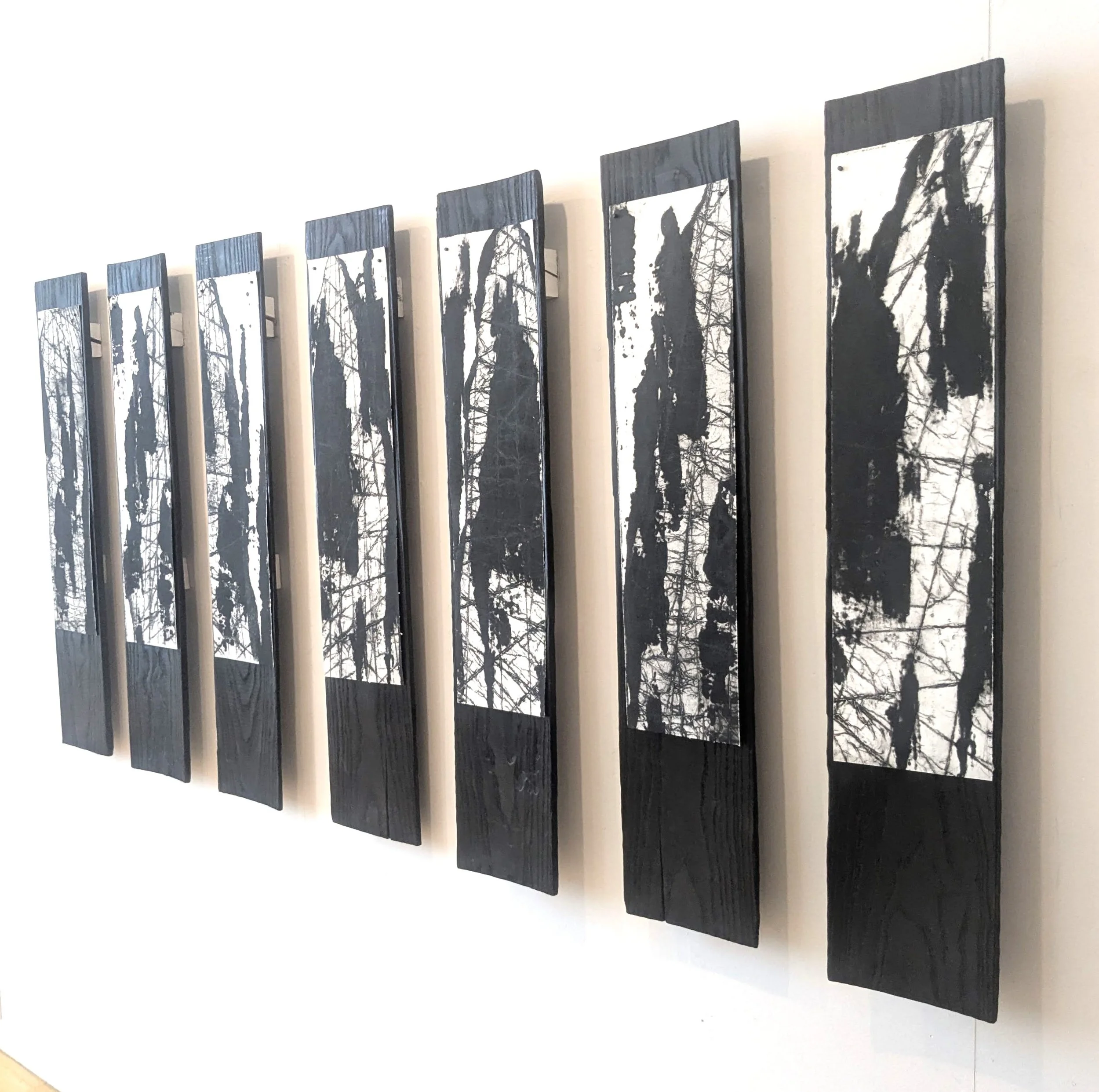 Collide, 2025, collagraph on burnt wood planks, 150 x 68cm
