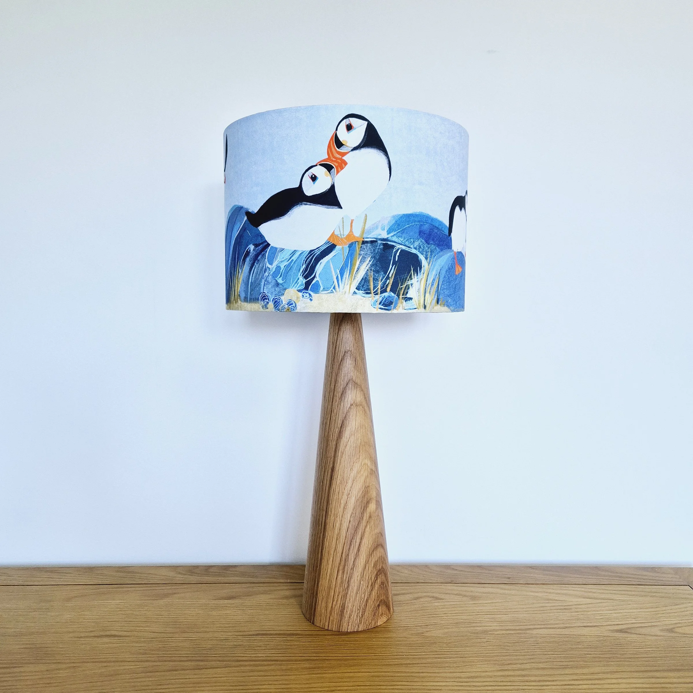 Puffin Island Lampshade by The Hedgerow Artist on oak lamp base