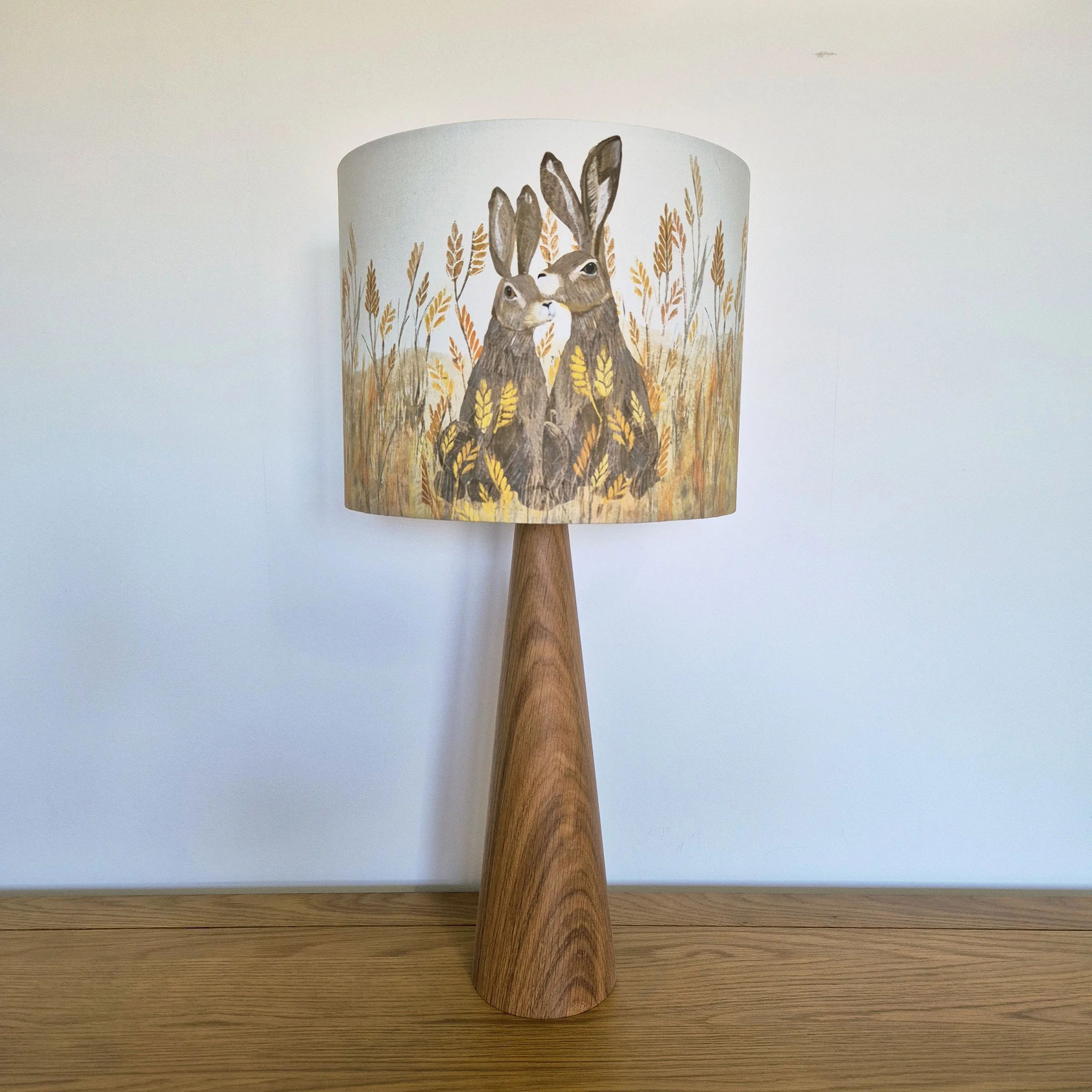 Hares Lampshade by The Hedgerow Artist on a wooden base