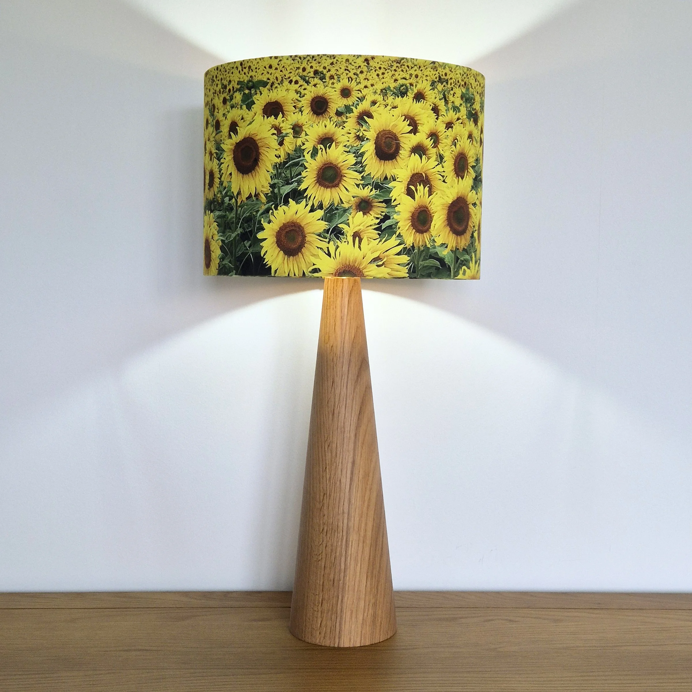 Stokesley Sunflowers Lampshade Illuminated on Oak Conical Base