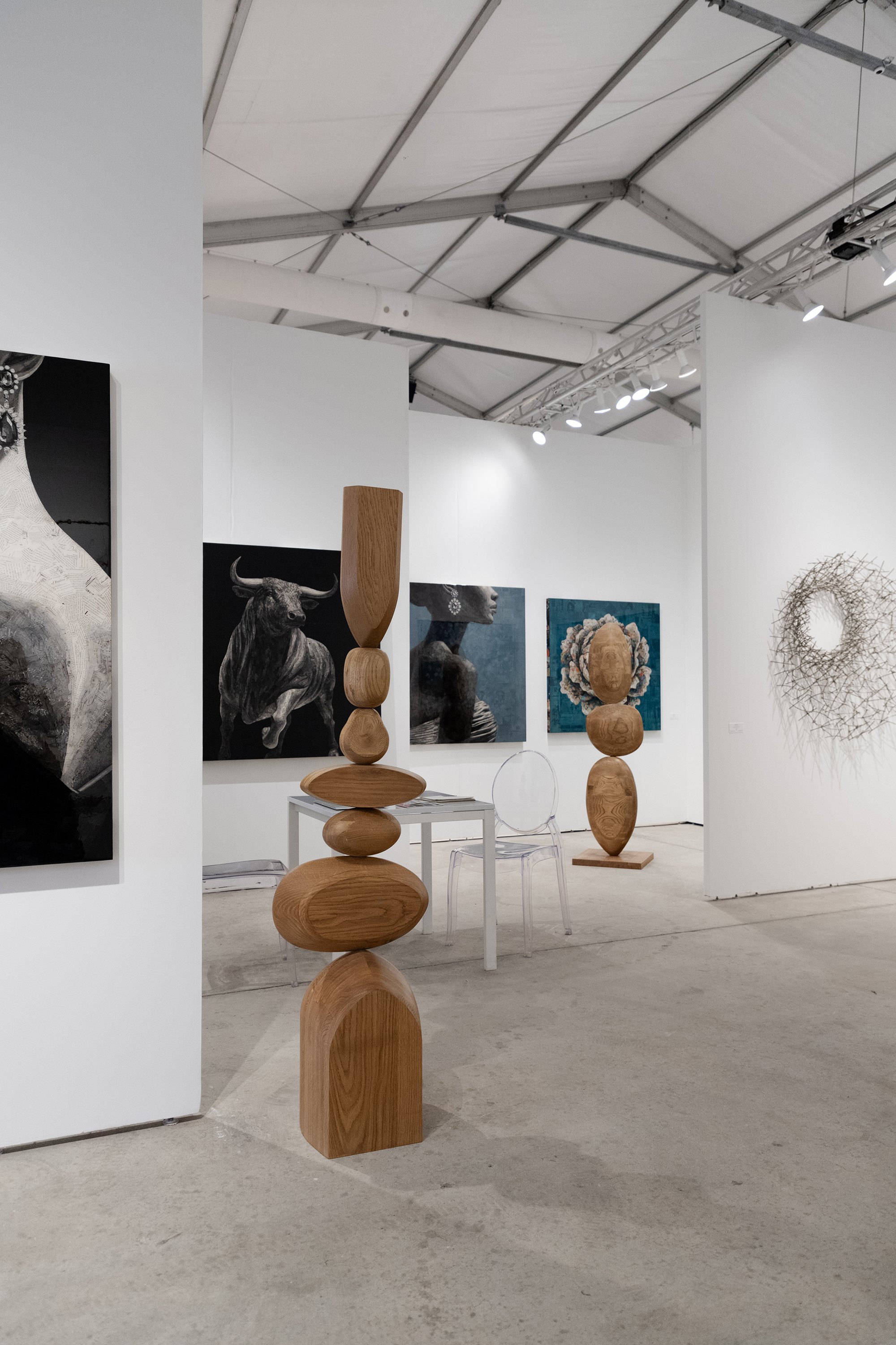  Joel Escalona's Still Stand wooden sculptures displayed at Art Miami with SBFA Gallery, captured by Mariana Achach. 
