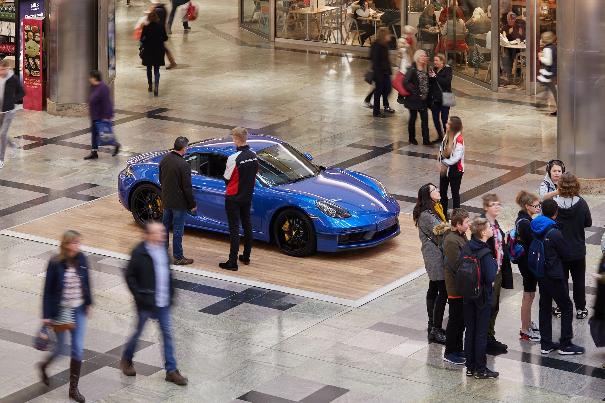 911 on display in shopping centre for a driving and sit in experience for the public to enjoy