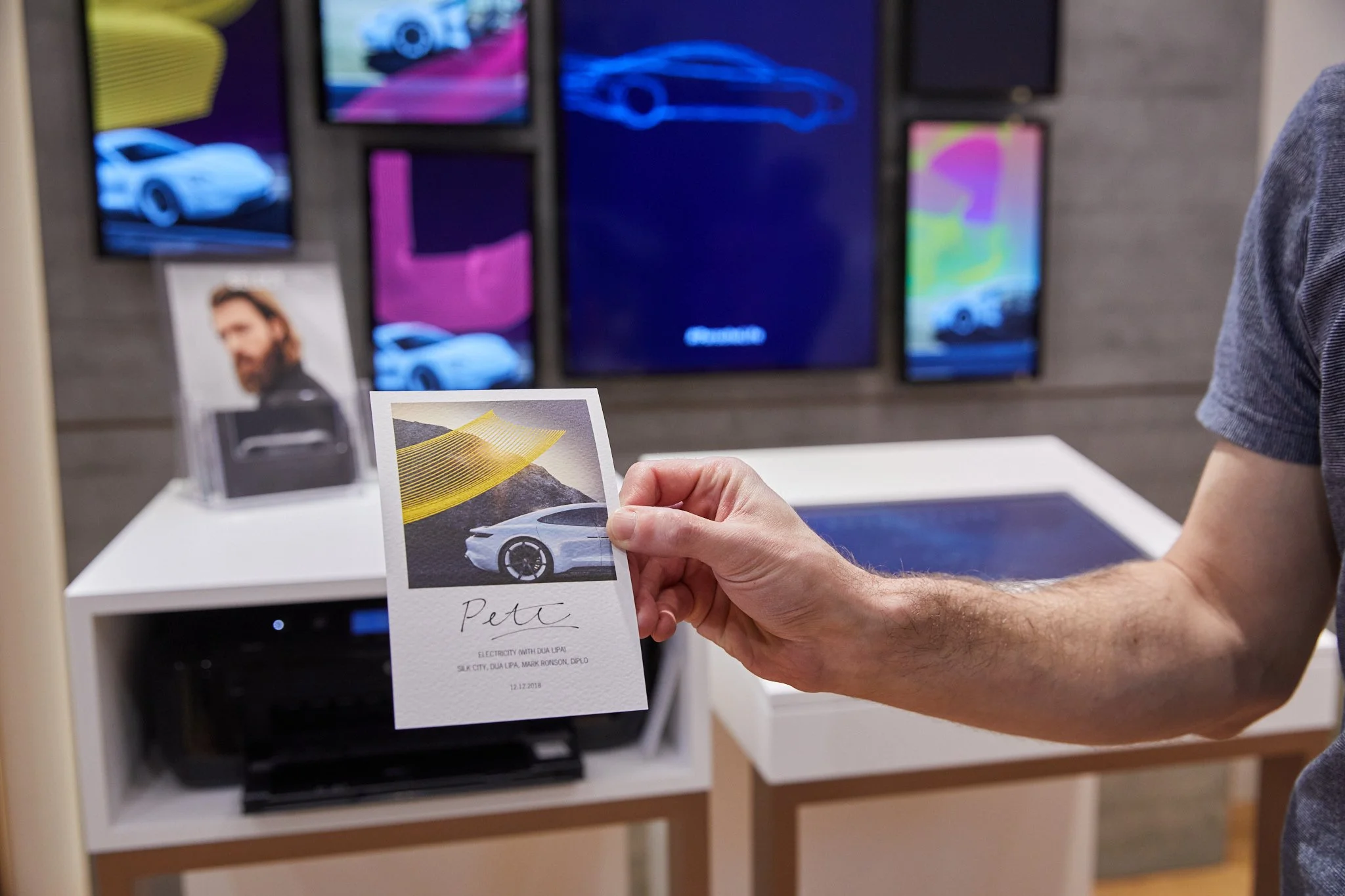 merchandise personalised at a Porsche retail store collected on the day at the pop up store retail photography