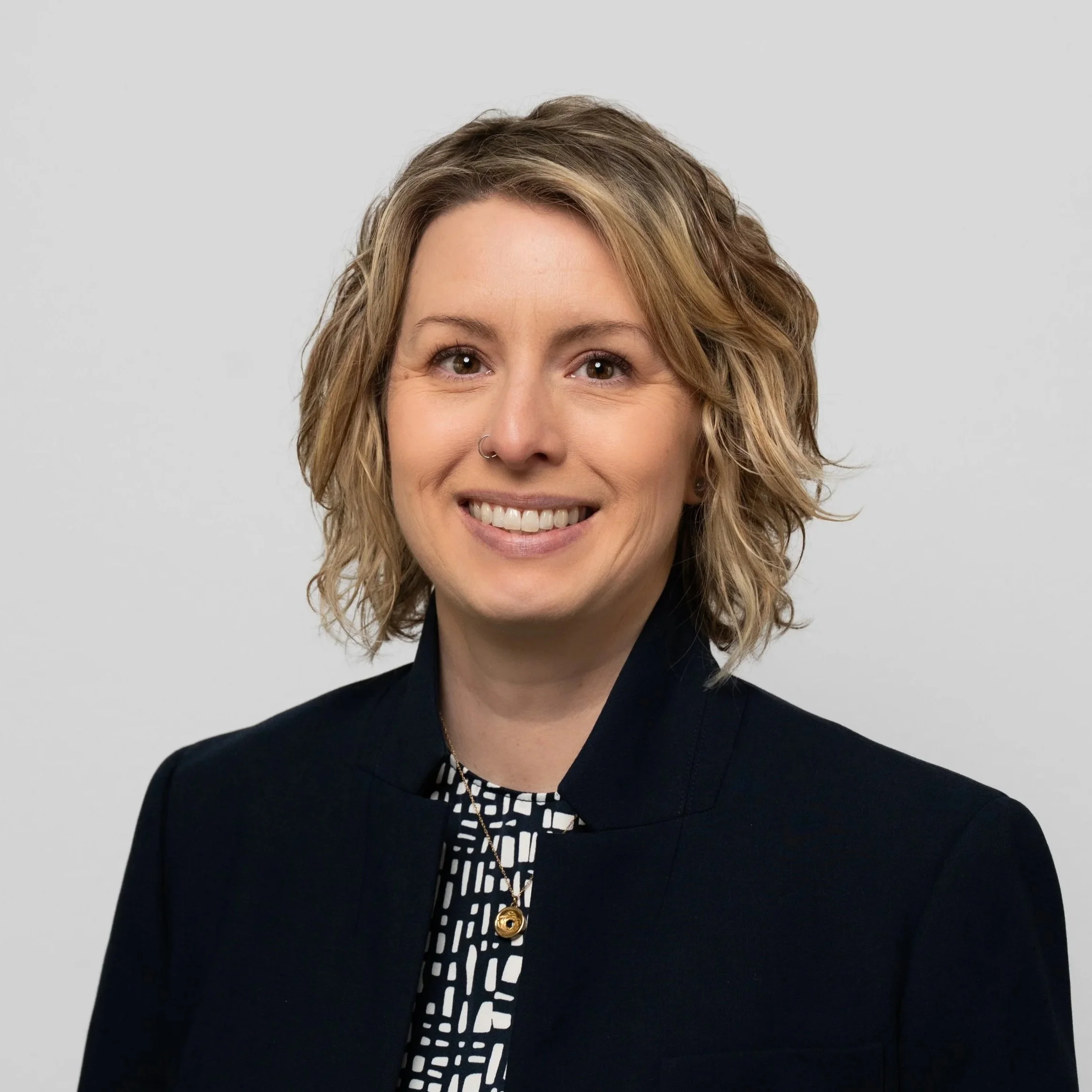 Meg Risk About Us — Benchmark Risk Group