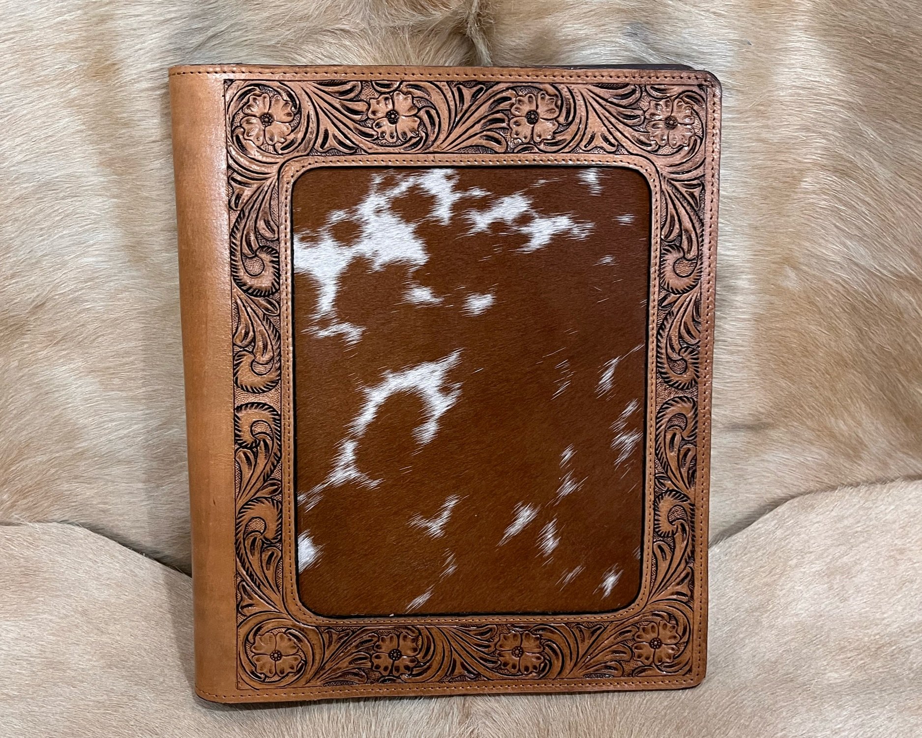 Cowhide Padfolio with Tooling $105
*Various designs available. Contact for availability and additional pictures.