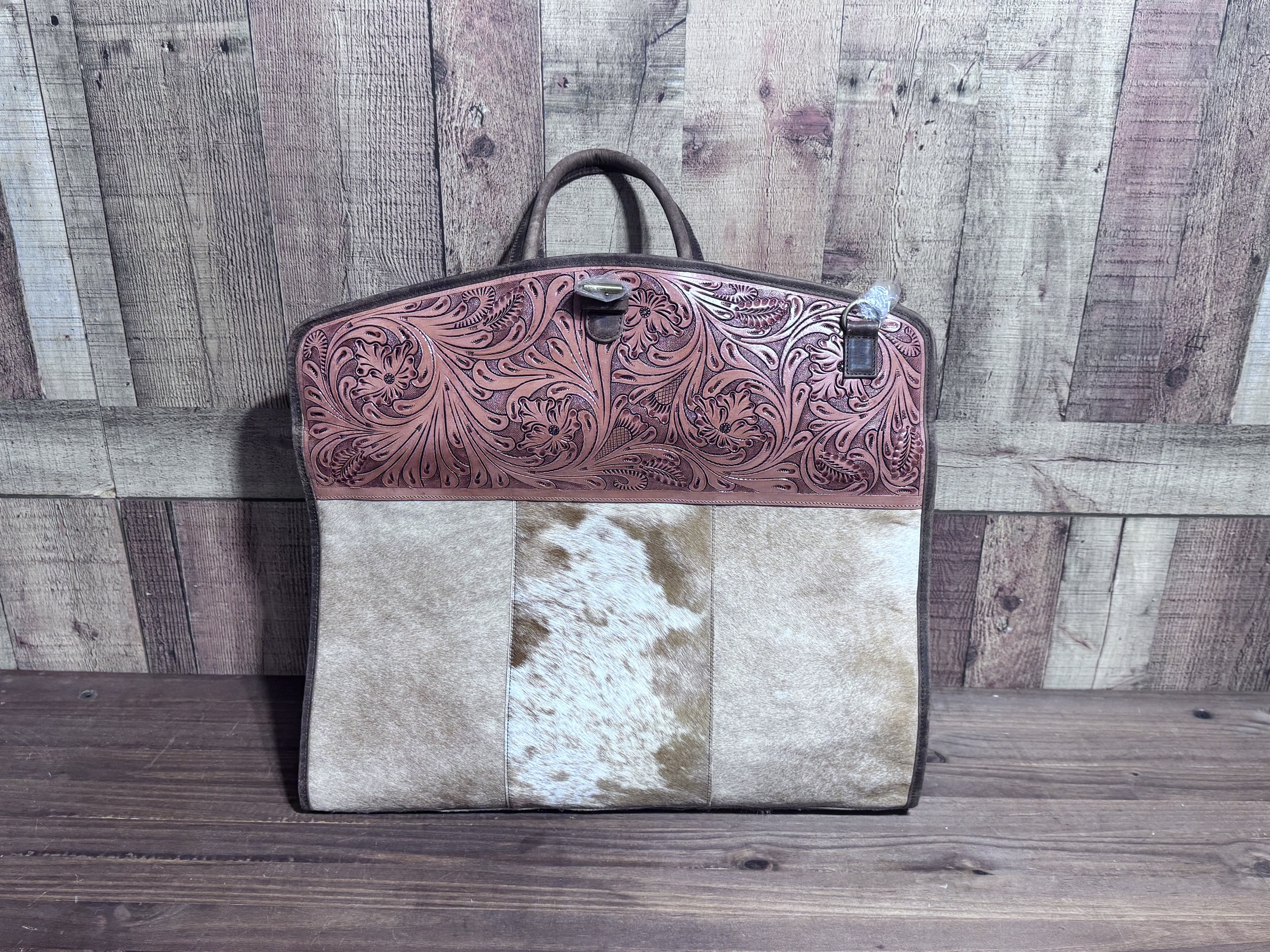 Tooled Garment with Cowhide: $240