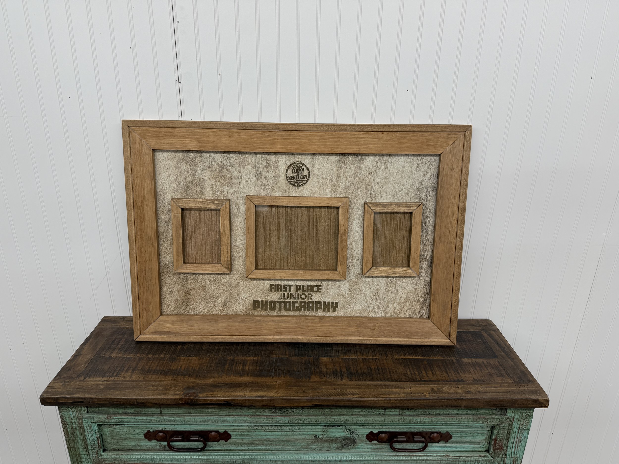 24x36 Picture Frame: $175 with Cowhide back Only, with Cowhide back and Gator edges :$200
* These are 2 portrait 5x7 and a landscape 8x10.