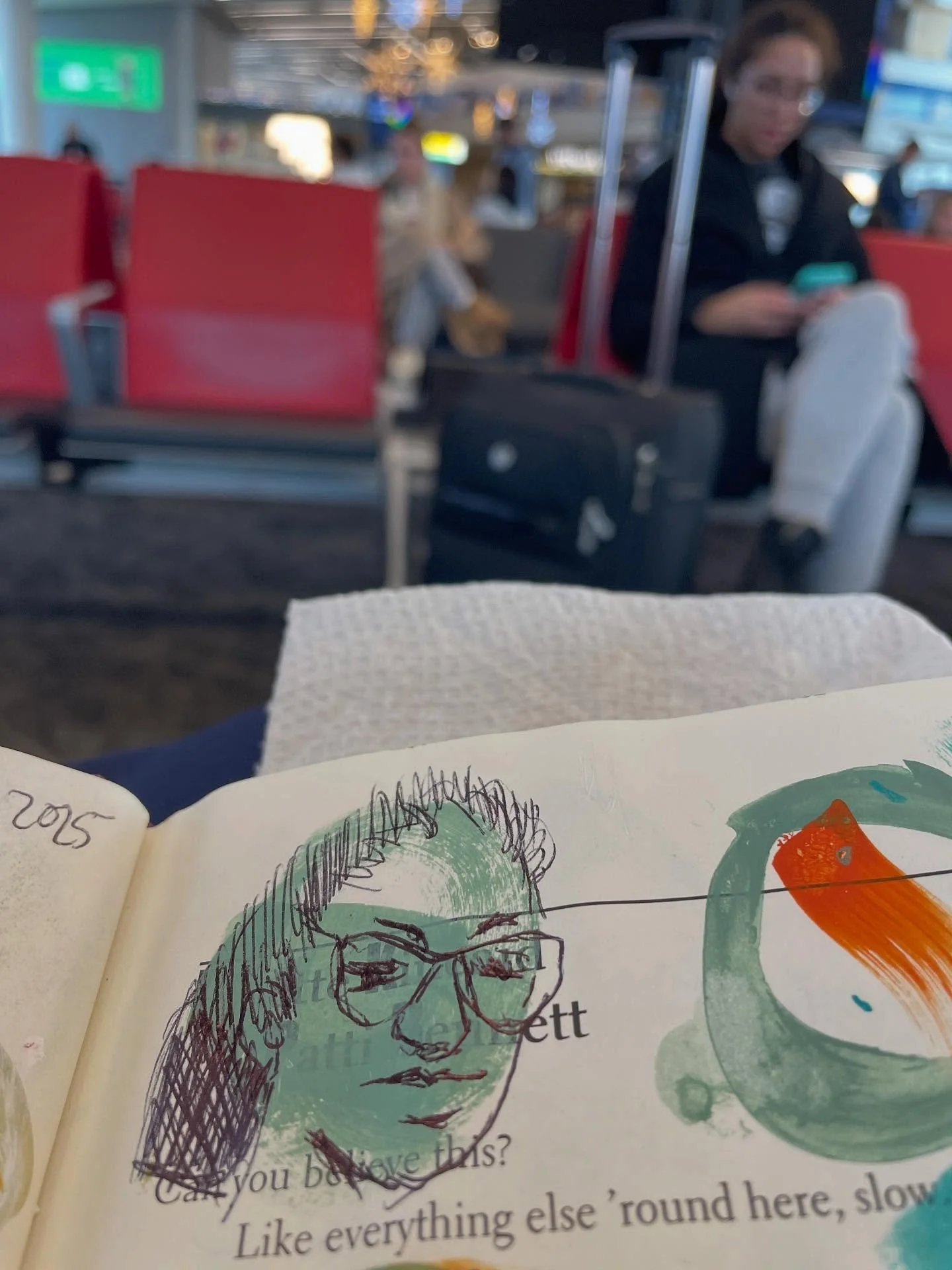 I play a game with myself when caught in limbo on trips- I try to draw a hundred heads in my sketchbook! Before leaving home I prep some pages with random colors and small shapes. Then time flies when I&rsquo;m waiting for my plane to board or train 