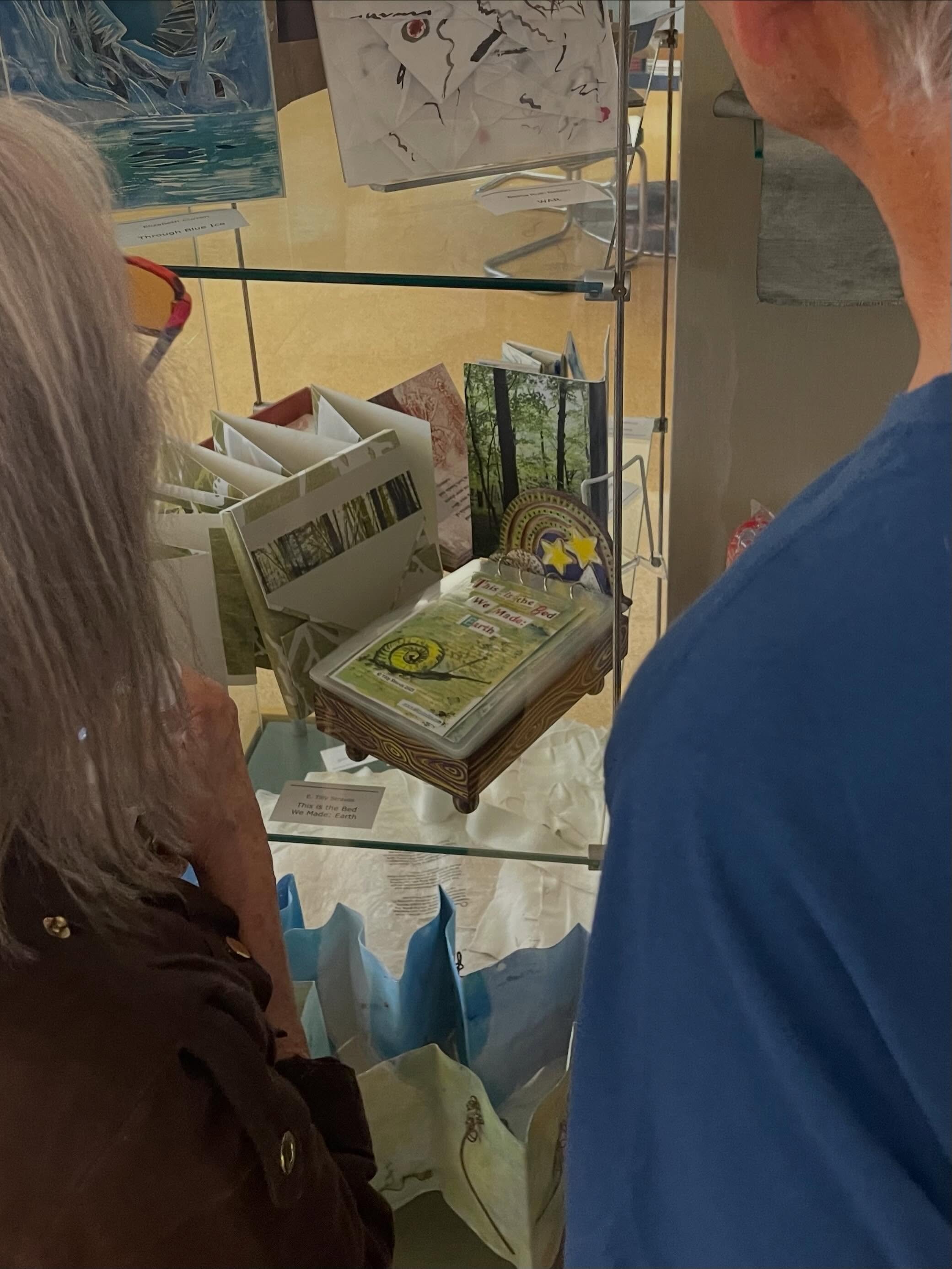 My book- made in the shape of a bed- rests in a glass case. The artist @susan.hennelly.775 has a really fun book available to hold and read about a bear and a bird. Wonderful collage works- hope to see it published!! #artistbooks #hudsonvalleyartists
