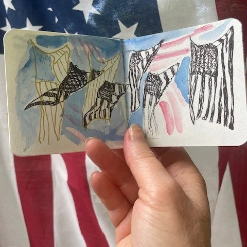 I am a country girl and a flag waving fool. I love how our stars and stripes flow in the breeze. 
A few years ago I recycled a fraying flag by patching it back together with portraits of a cow and some chickens. It was displayed in the window of a sm