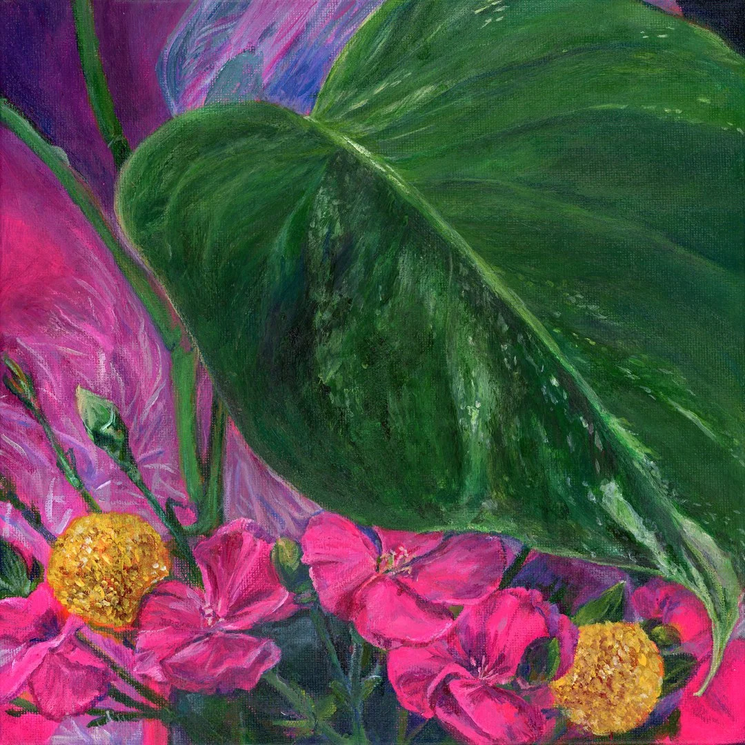 Spotted Monstera leaf dances with pink and yellow flowers