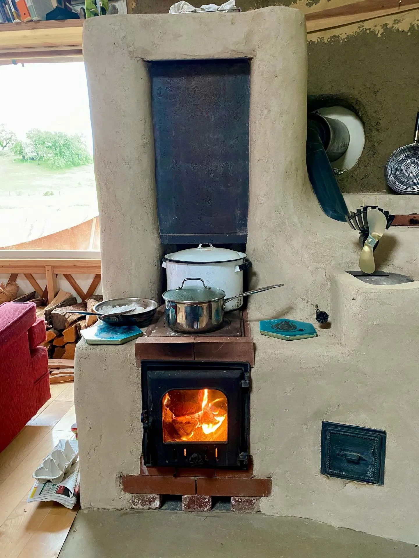 We have been getting a lot of questions about Rocket Stoves lately.  Heres a brief overview.  I will post a link in our stories to a blog post on our website that shows the building details of this stove pictured here.  Check it out if you want more 