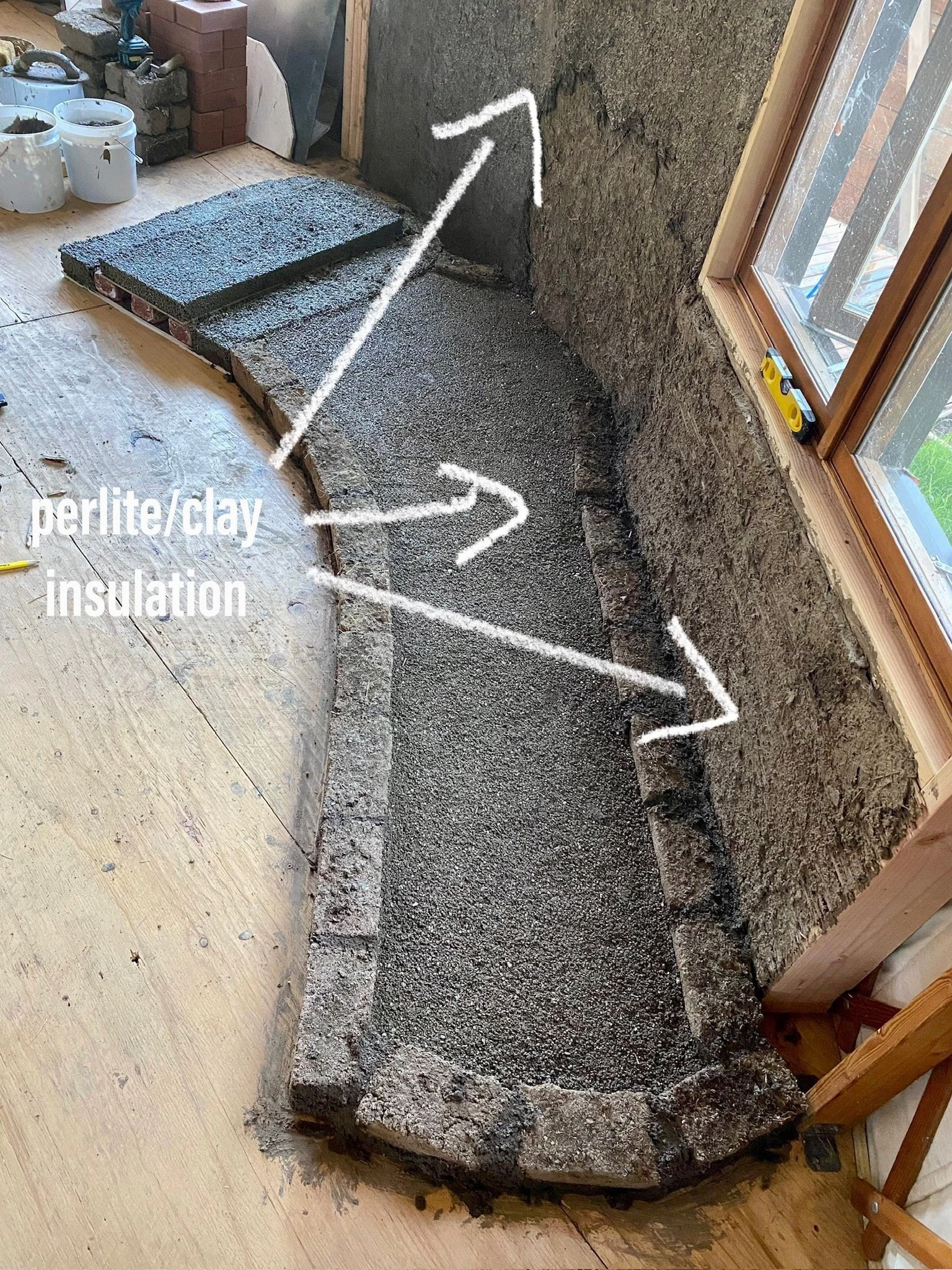 We also added perlite clay insulation behind the heater, so we dont loose heat to the outside.  