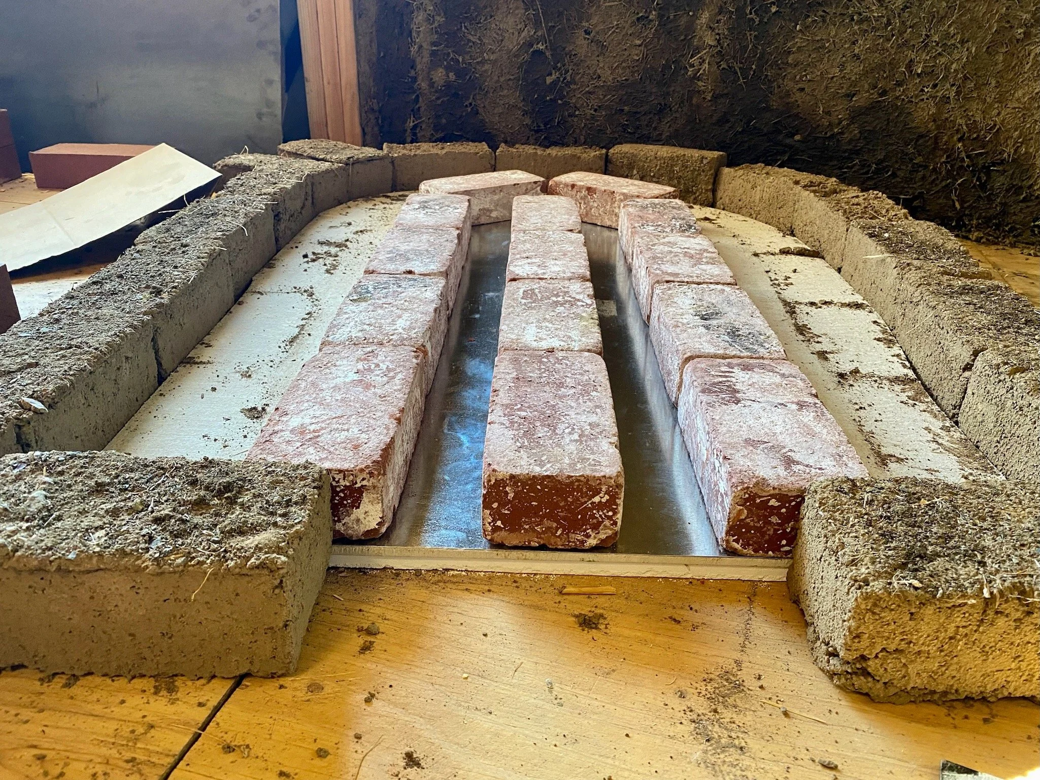 Creating an air space between burn chamber and wooden floor