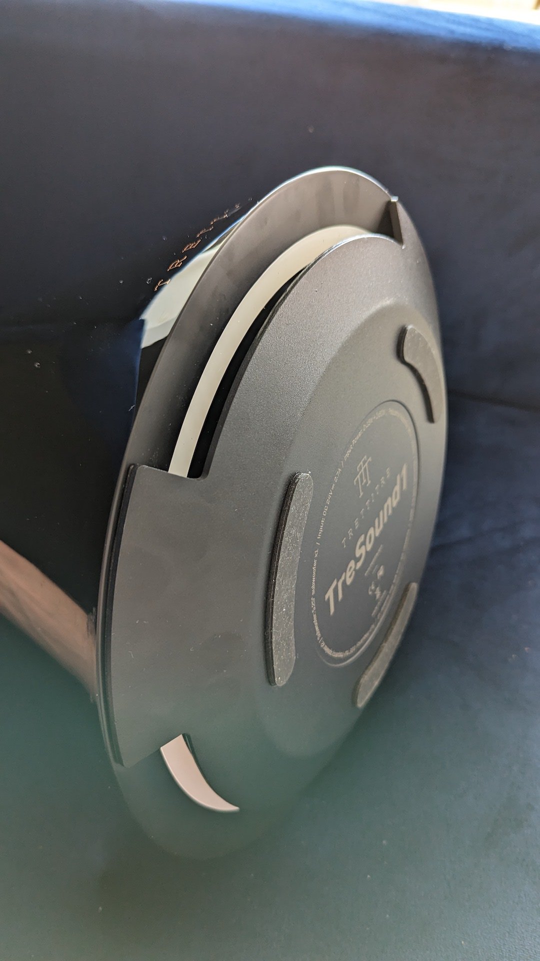Photo of the base of the speaker showing the venting for the large woofer.