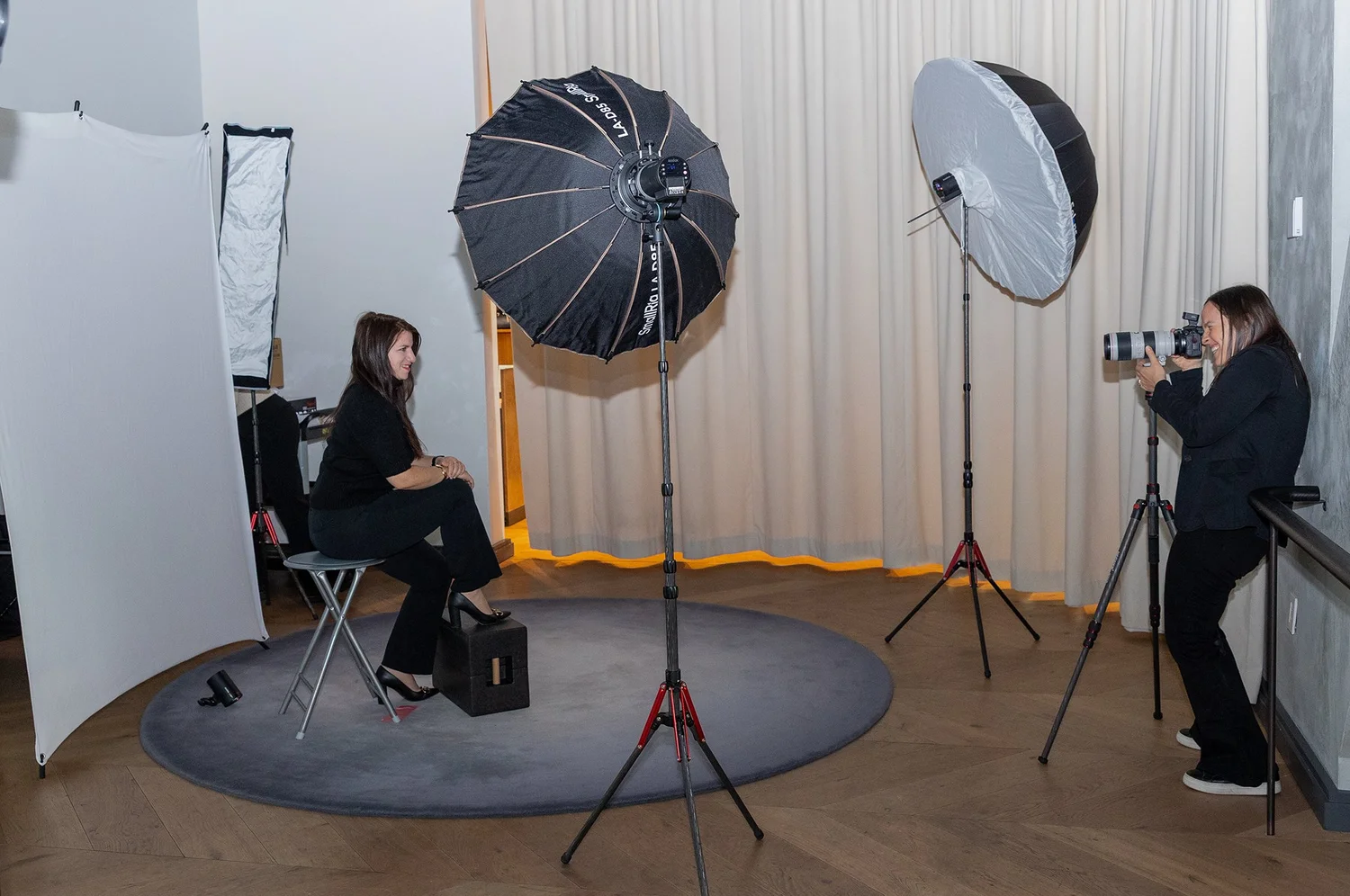Blue Sky's Studio photographer running a tenant headshot amenity day in a Manhattan office building lounge