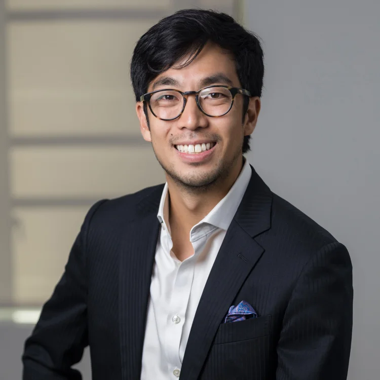C-suite executive headshot photographed in his New York office