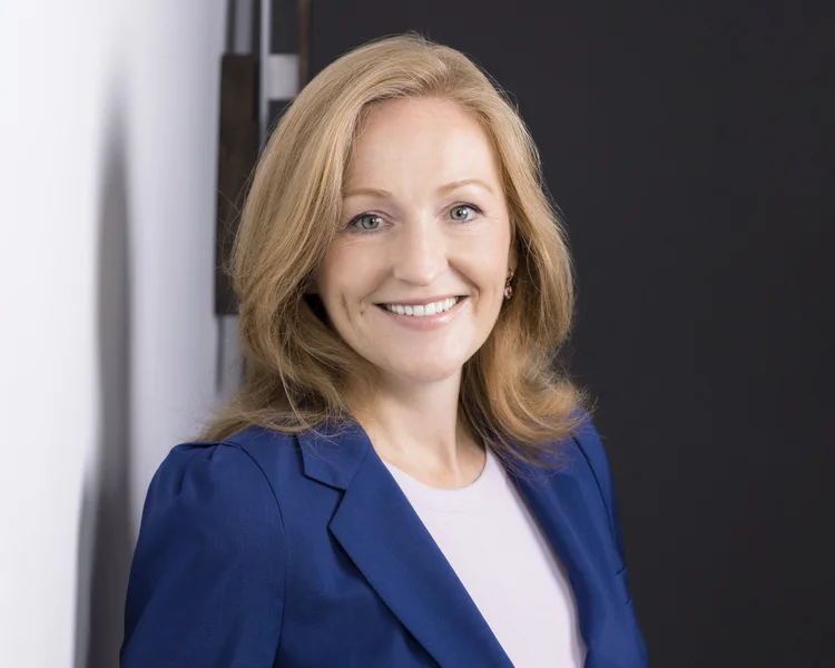 Executive headshot of a woman photographed in her New York office