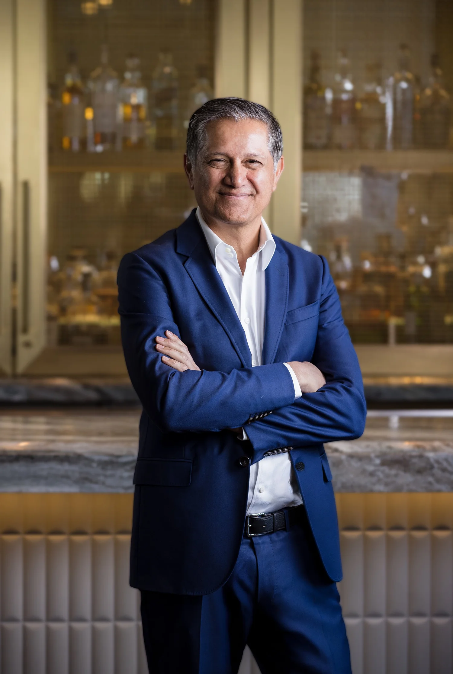 Pharmaceutical executive portrait in a wood-paneled office, New York City