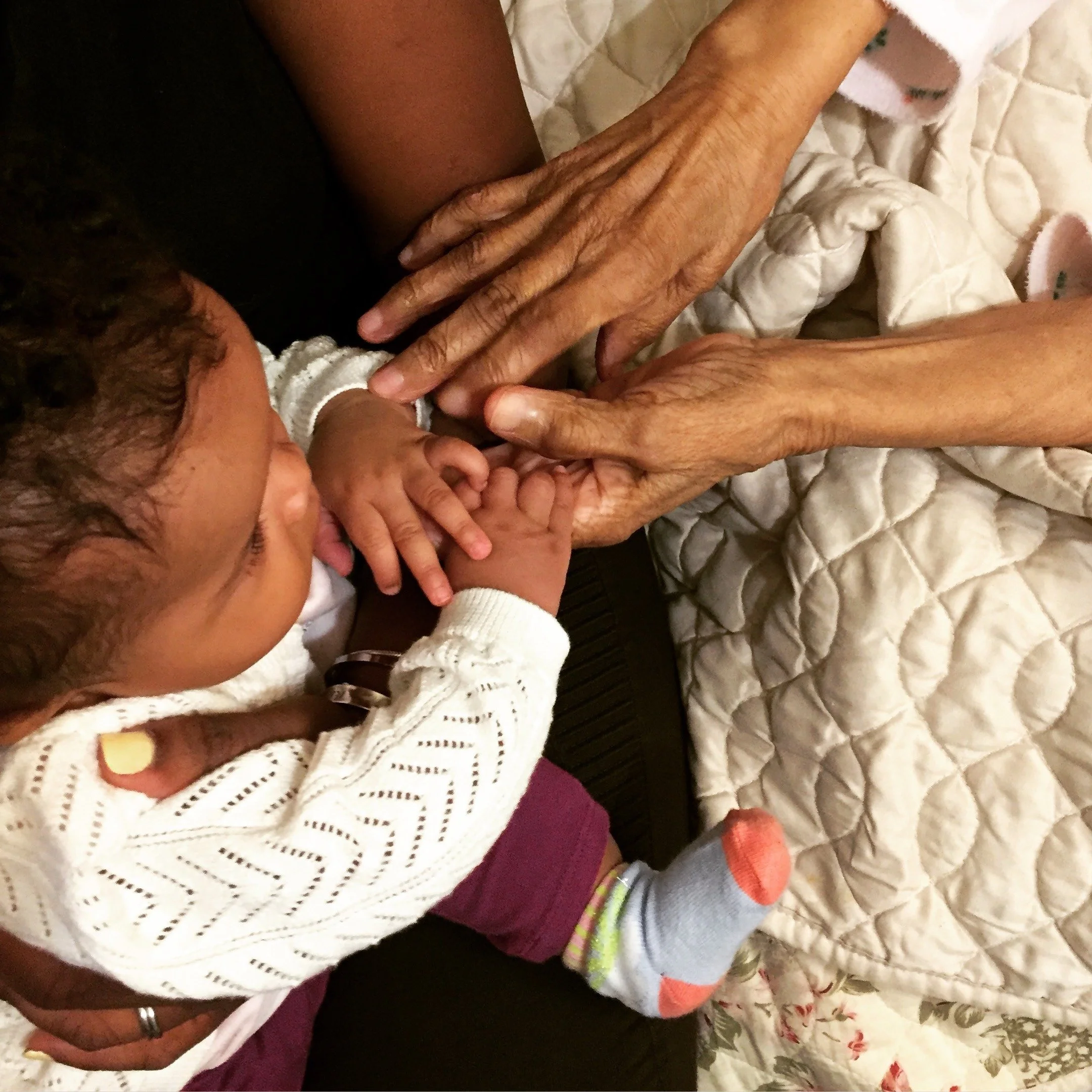 Today, we honor the beauty, strength, tenderness, and legacy of motherhood. 🤍

In this image, the hands of a daughter, granddaughter, and great-grandmother&mdash;nearly 100 years old&mdash;tell a story of love passed down through generations. A stor