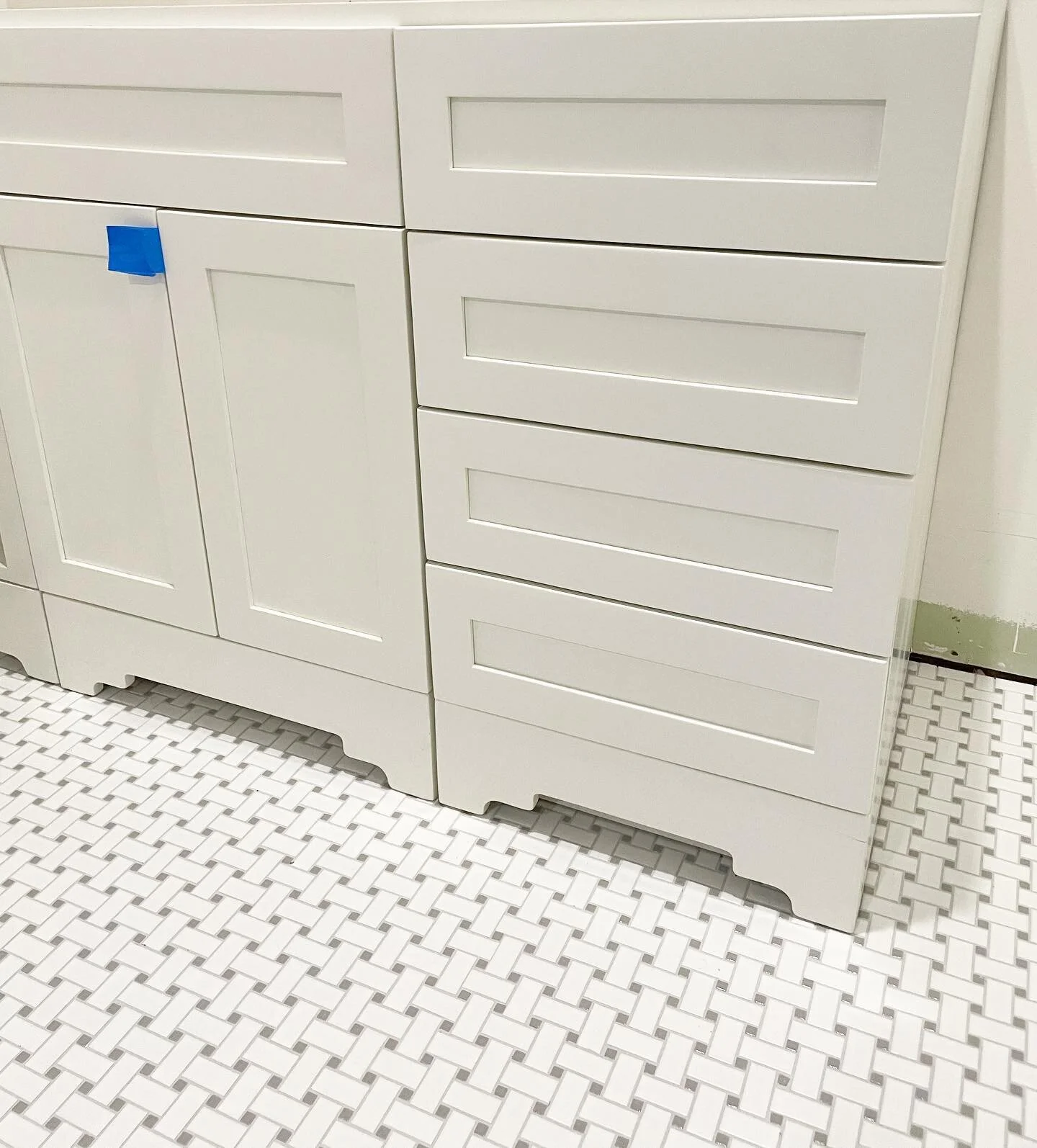 New tile installed and a custom vanity with a hidden pull out stool in front of the sink 👌🏼