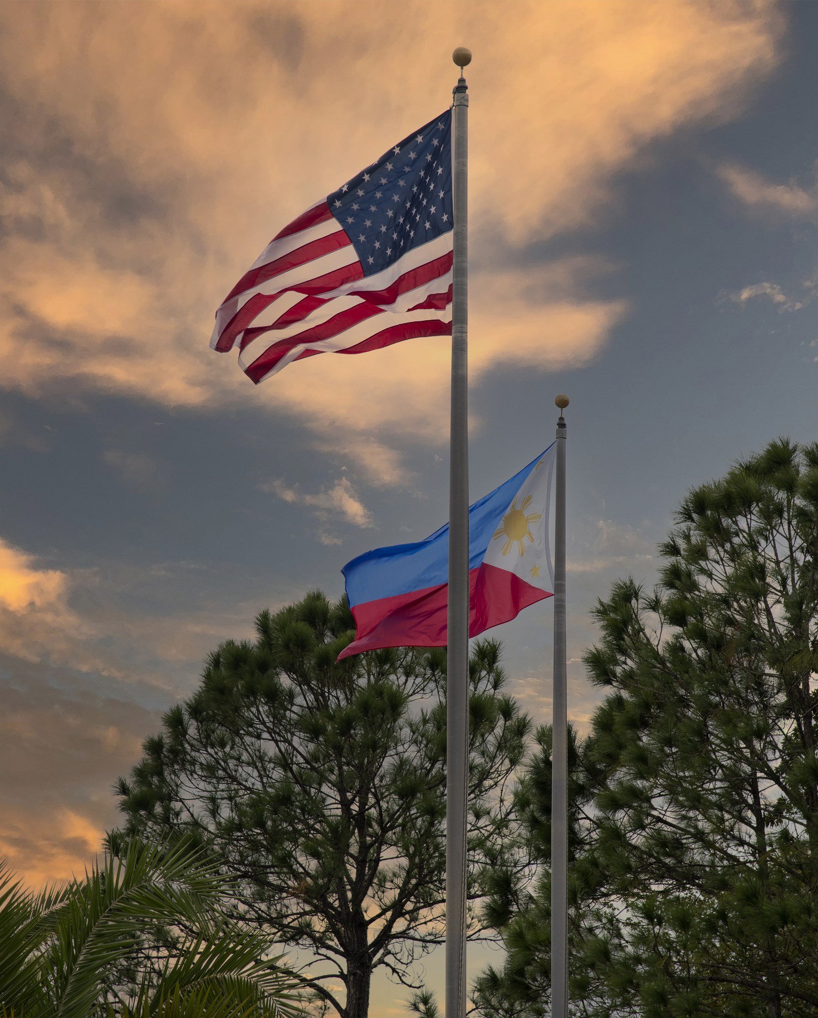 MMD_3143 · US and Philippine flags at dusk, Filipino cultural fair, Tampa, Florida