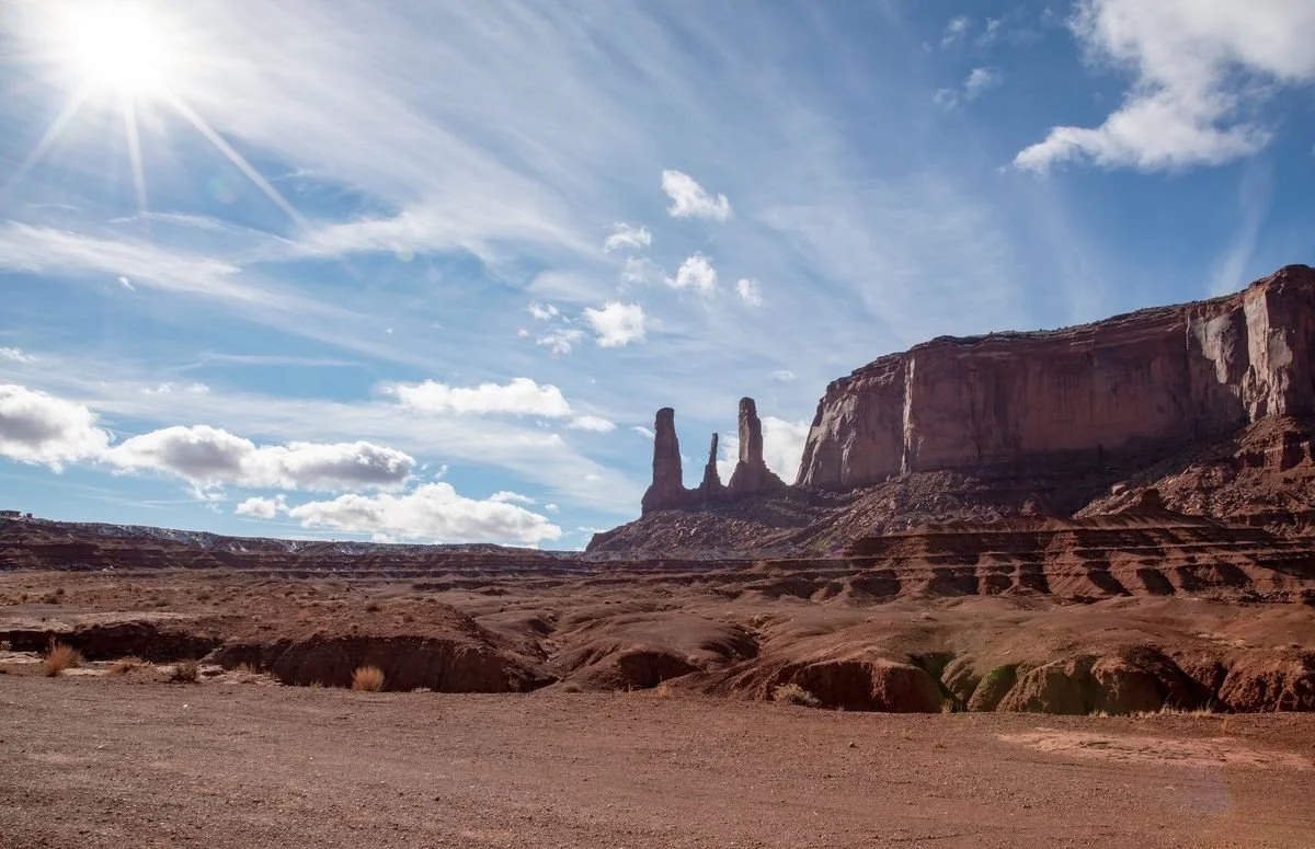 MMD_4650 · Three Sisters spires and sunburst, Monument Valley, Arizona
