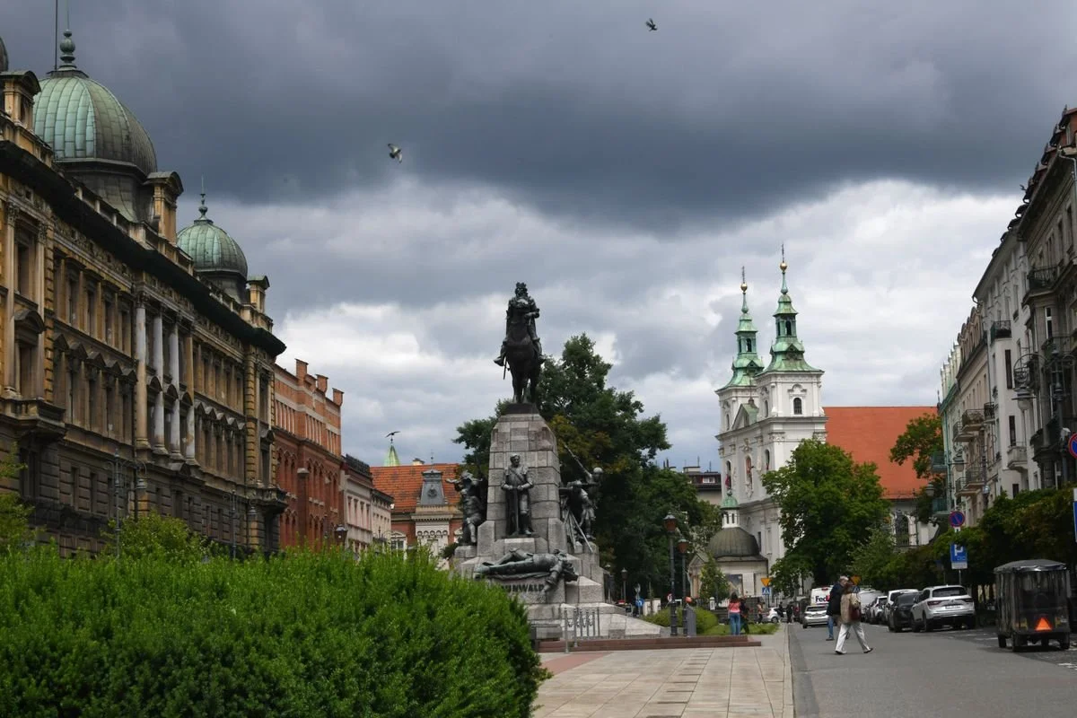 MAC_5395 · Monument and church towers under a stormy sky, Krakow, Poland