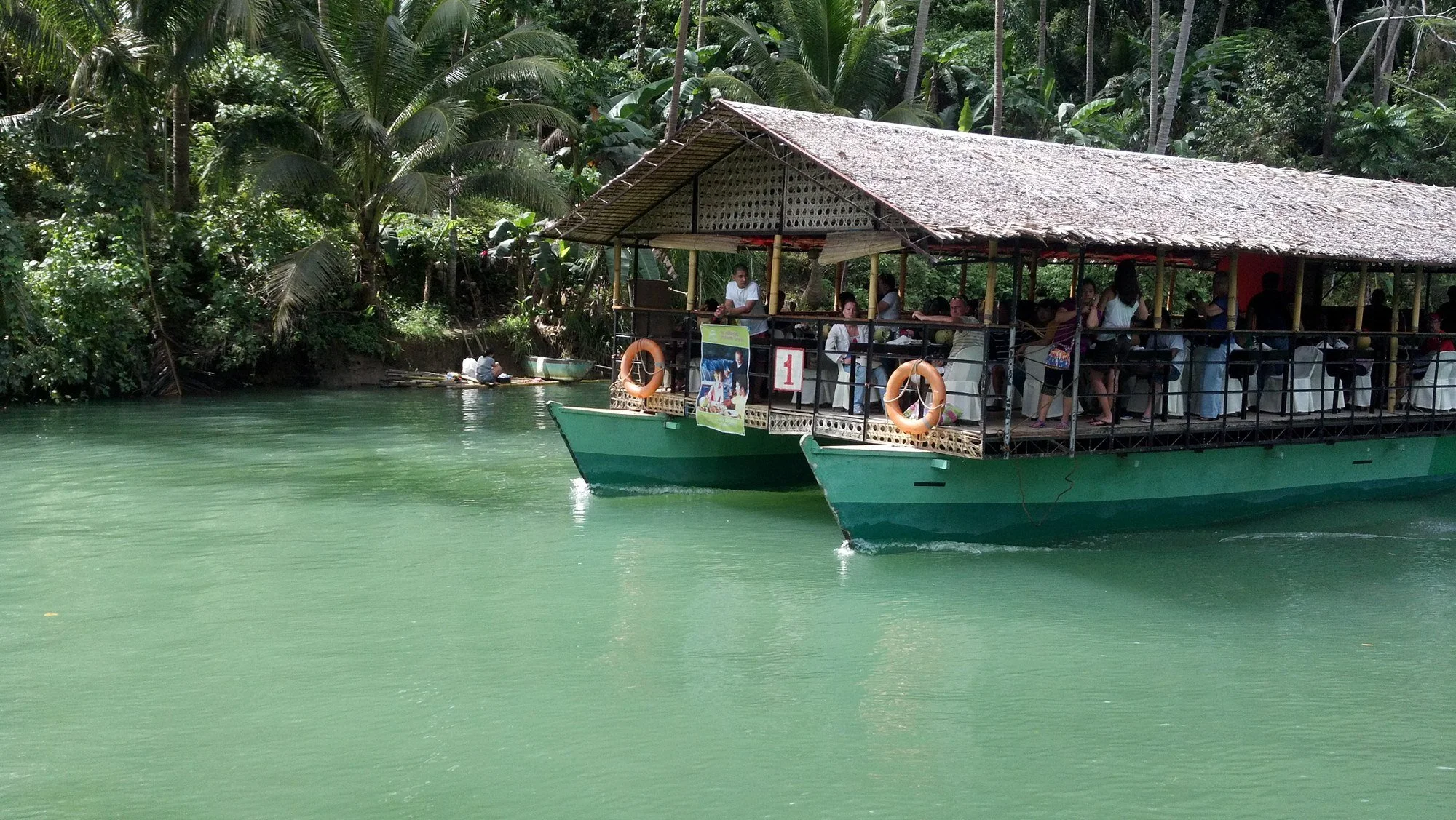2011-11-23_12-59-35_188 · River cruise boats on the Loboc, Bohol, Philippines