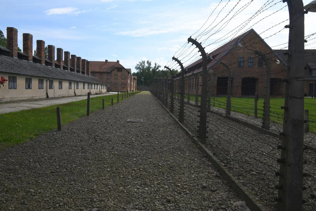MAC_5467 · Double barbed-wire fence and blocks, Auschwitz I, Poland