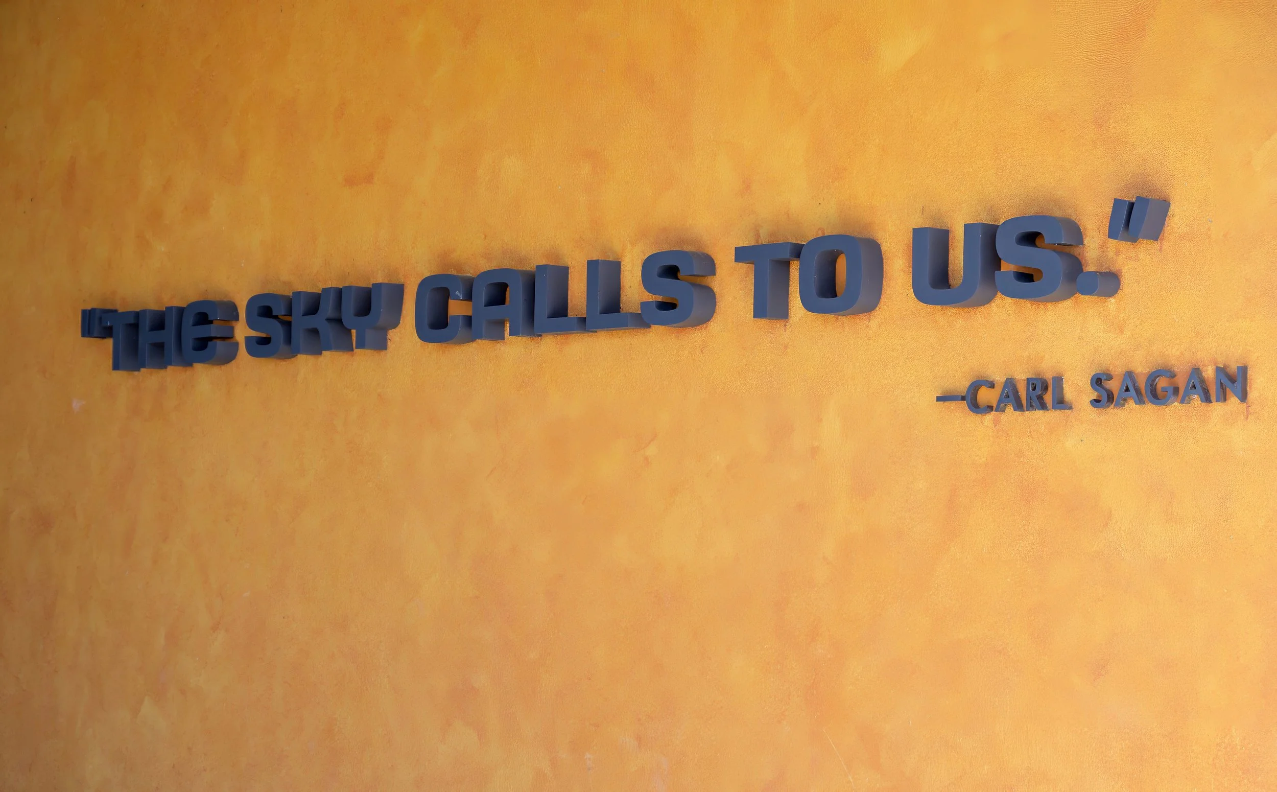 _ED06031 CARL SAGAN QUOTE ON WALL OF NASA.jpg