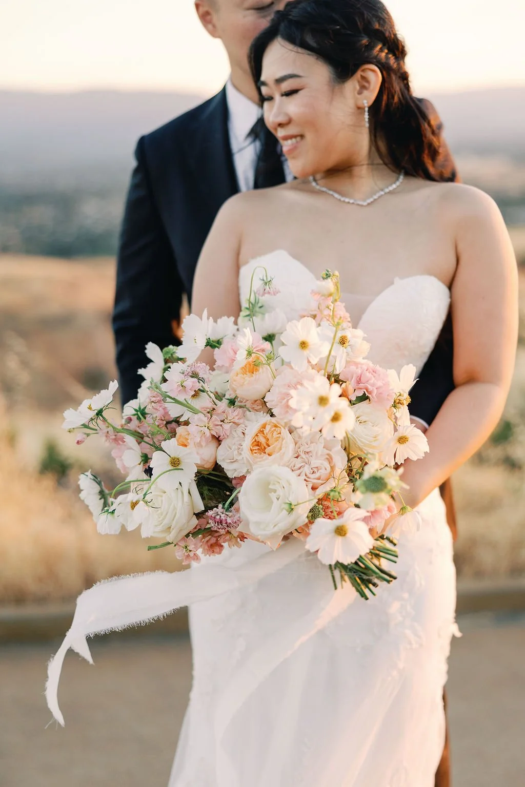 windswept couple's wedding photos
