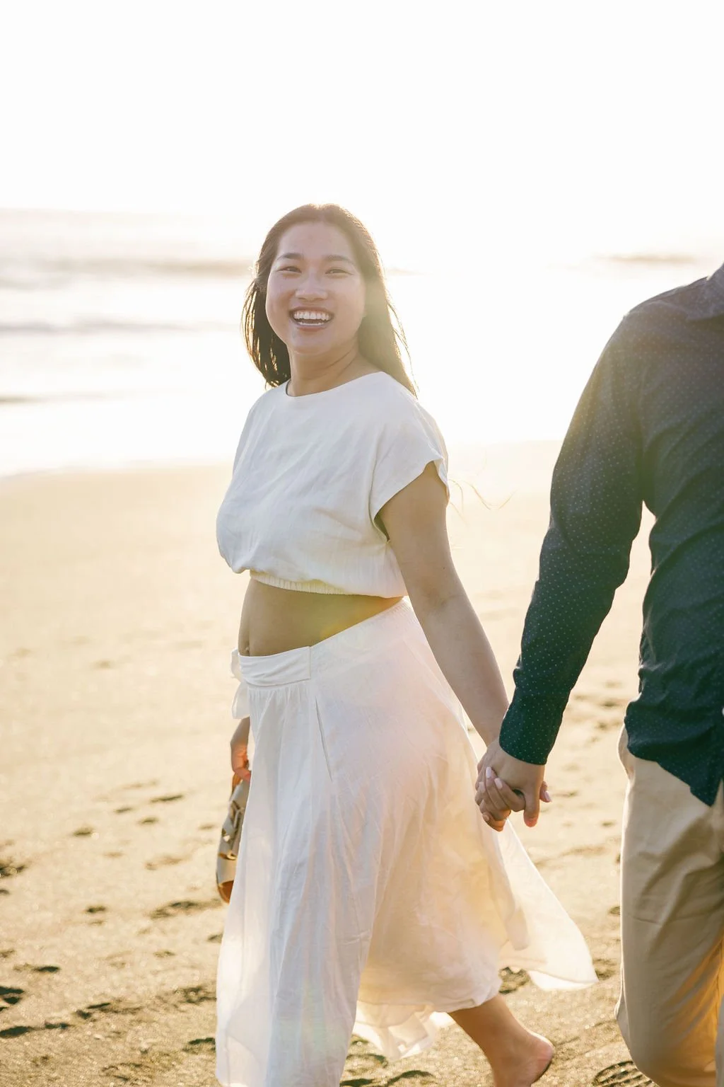 rode beach engagement