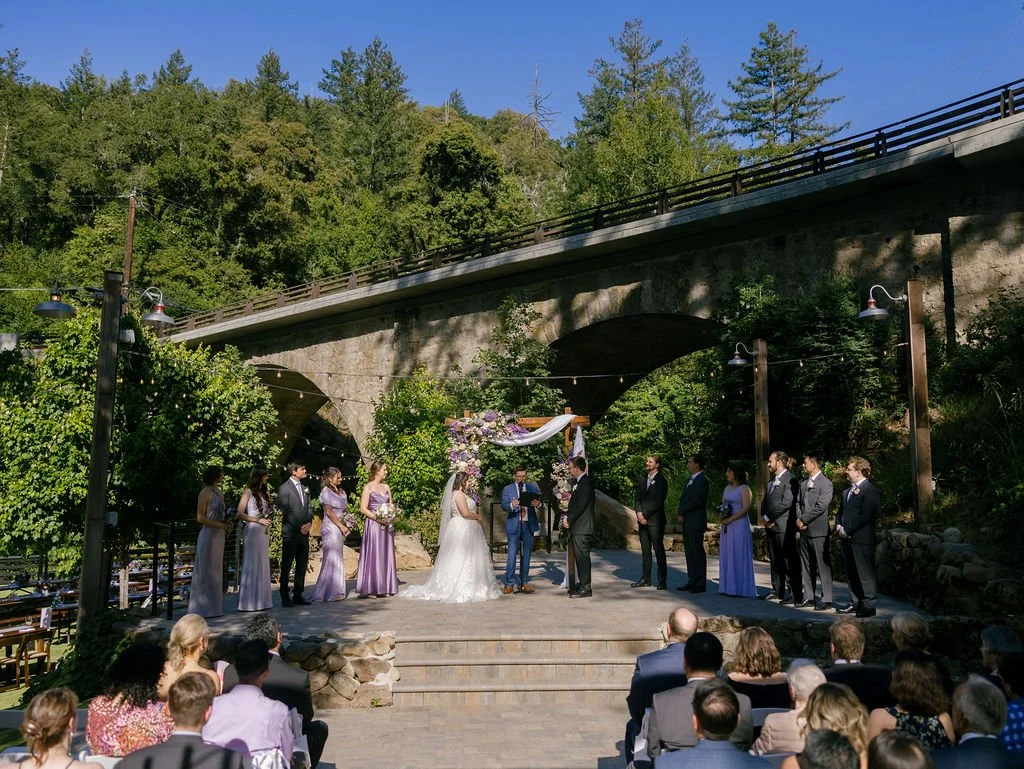stone arch bridge wedding ceremony