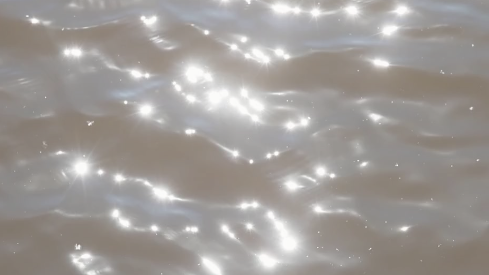 Sea Spark Creative Website Background - Website Waves Sparkles.png