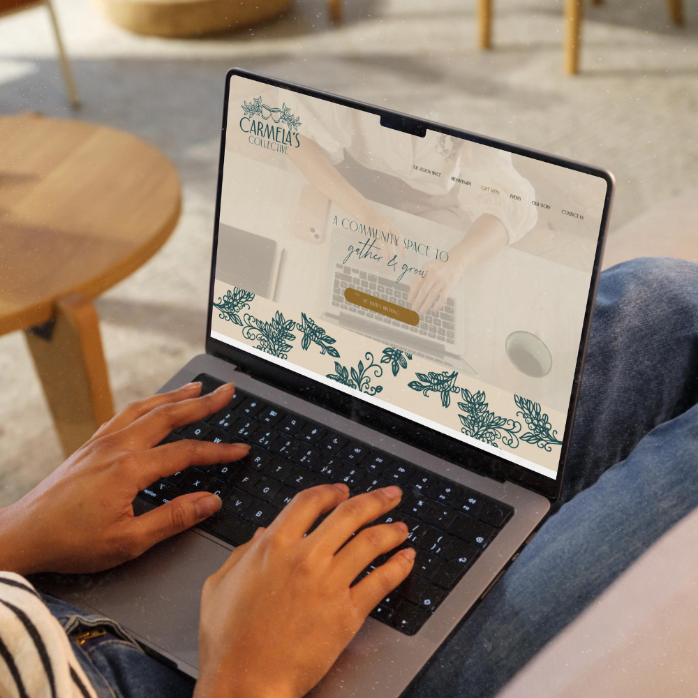 Person working on a laptop outdoors, showing a website titled 'Carmela's Collective' with a community space theme.