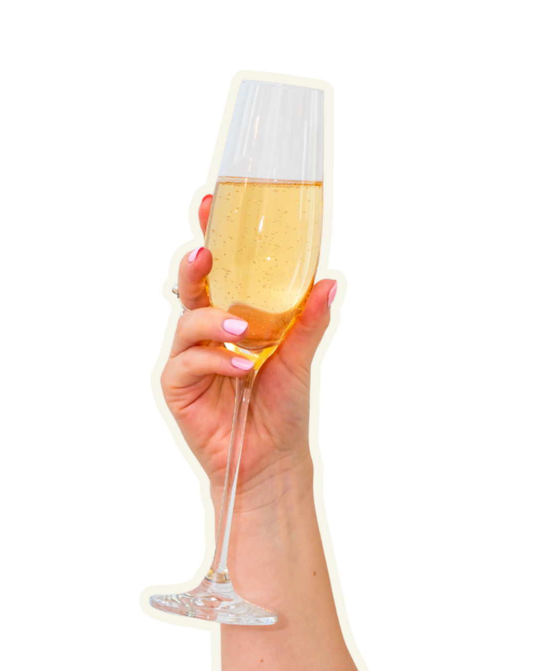 A hand with pink nail polish holding a champagne flute filled with a bubbly, golden-colored sparkling wine.