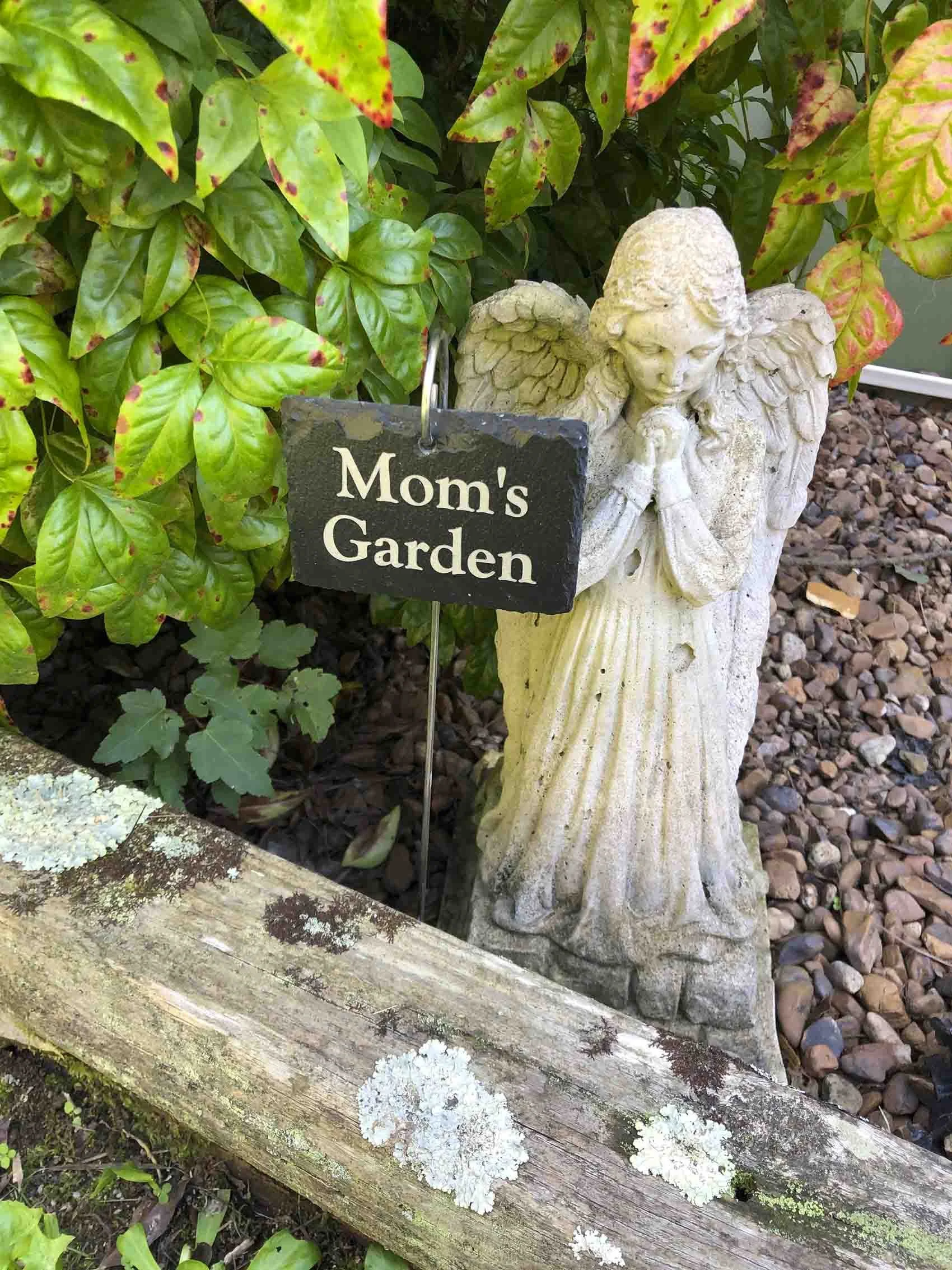 Slate stone with Moms garden engraved on it for a garden sign
