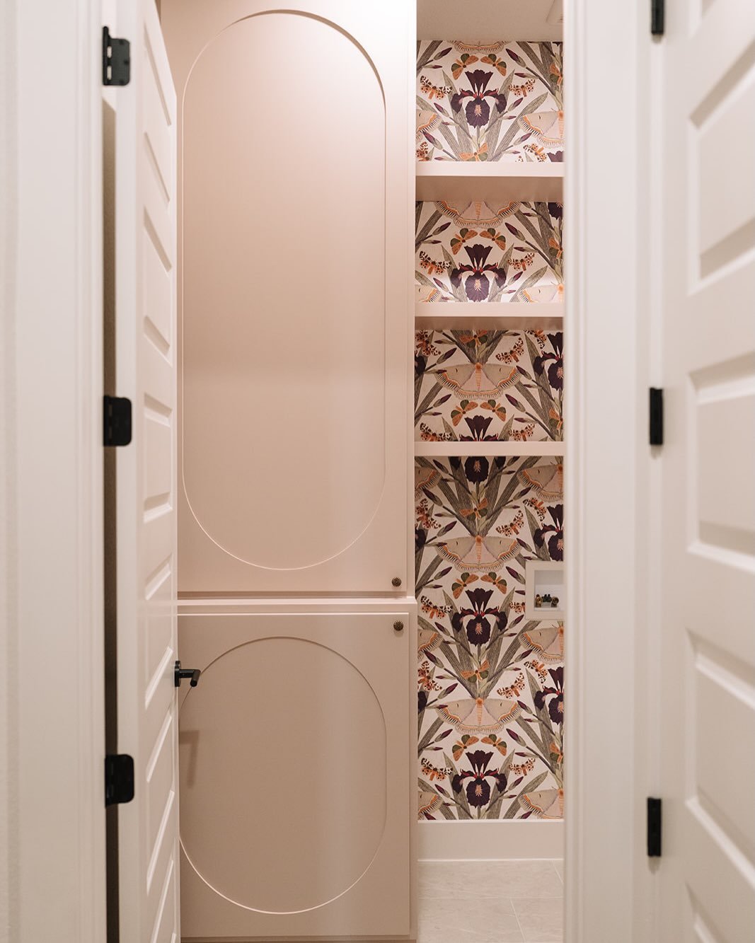 Imagine coming home to your new laundry room&mdash;where every detail feels intentional, elevated, and effortlessly functional. The custom cabinetry features softly curved arch detailing, a warm painted finish, and delicate antique brass hardware, wh
