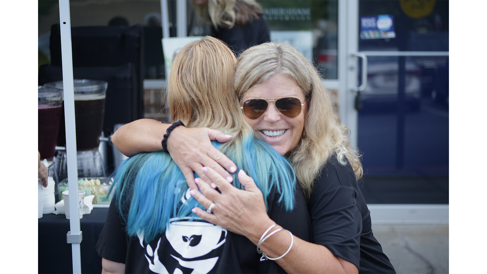 devon and jackie hug copy 2.png