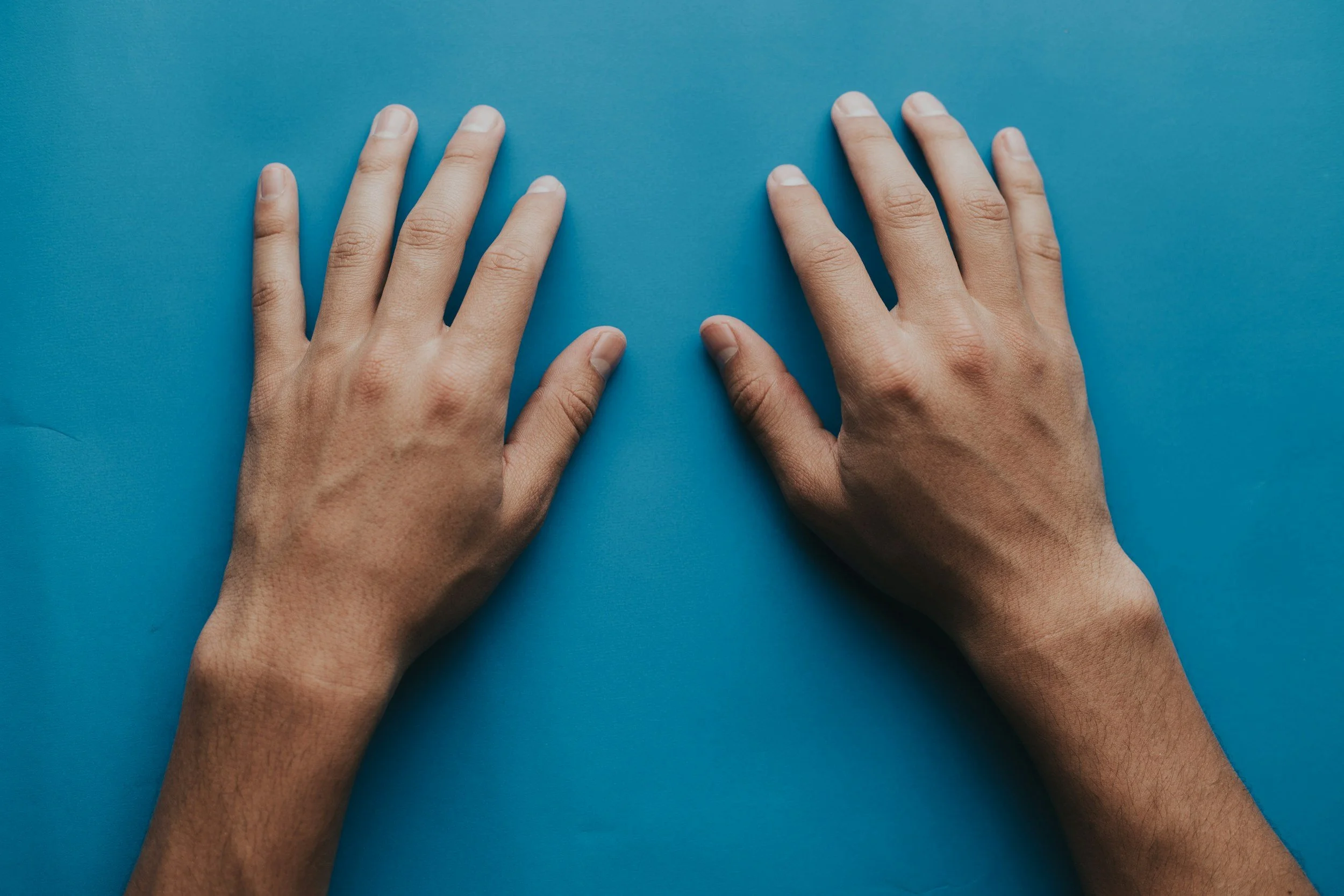 7 Signs It’s Time for a Hardworking Dad to See a Hand Doctor