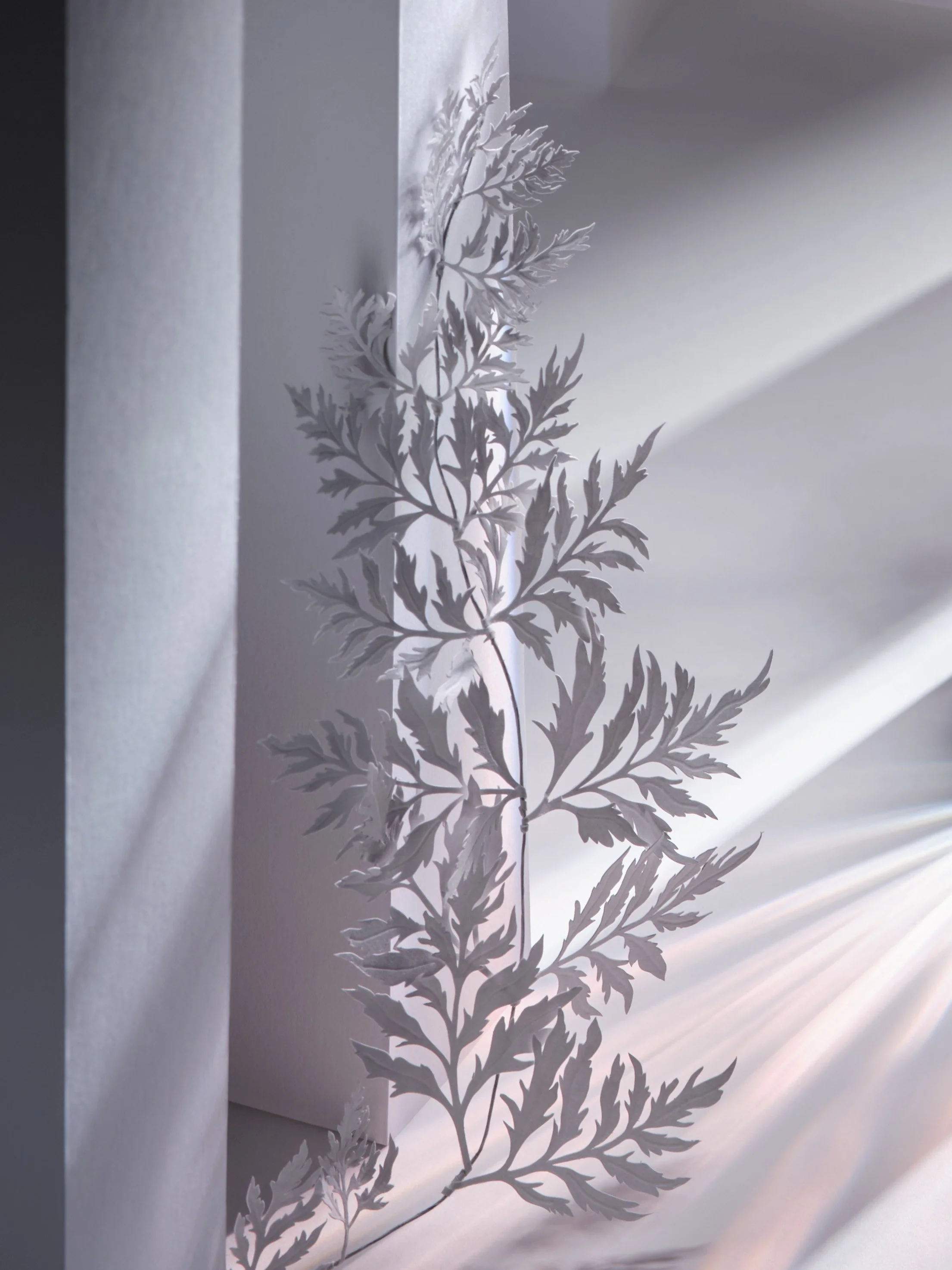 detailed paper art leaf cutout in an paper art architecture set design