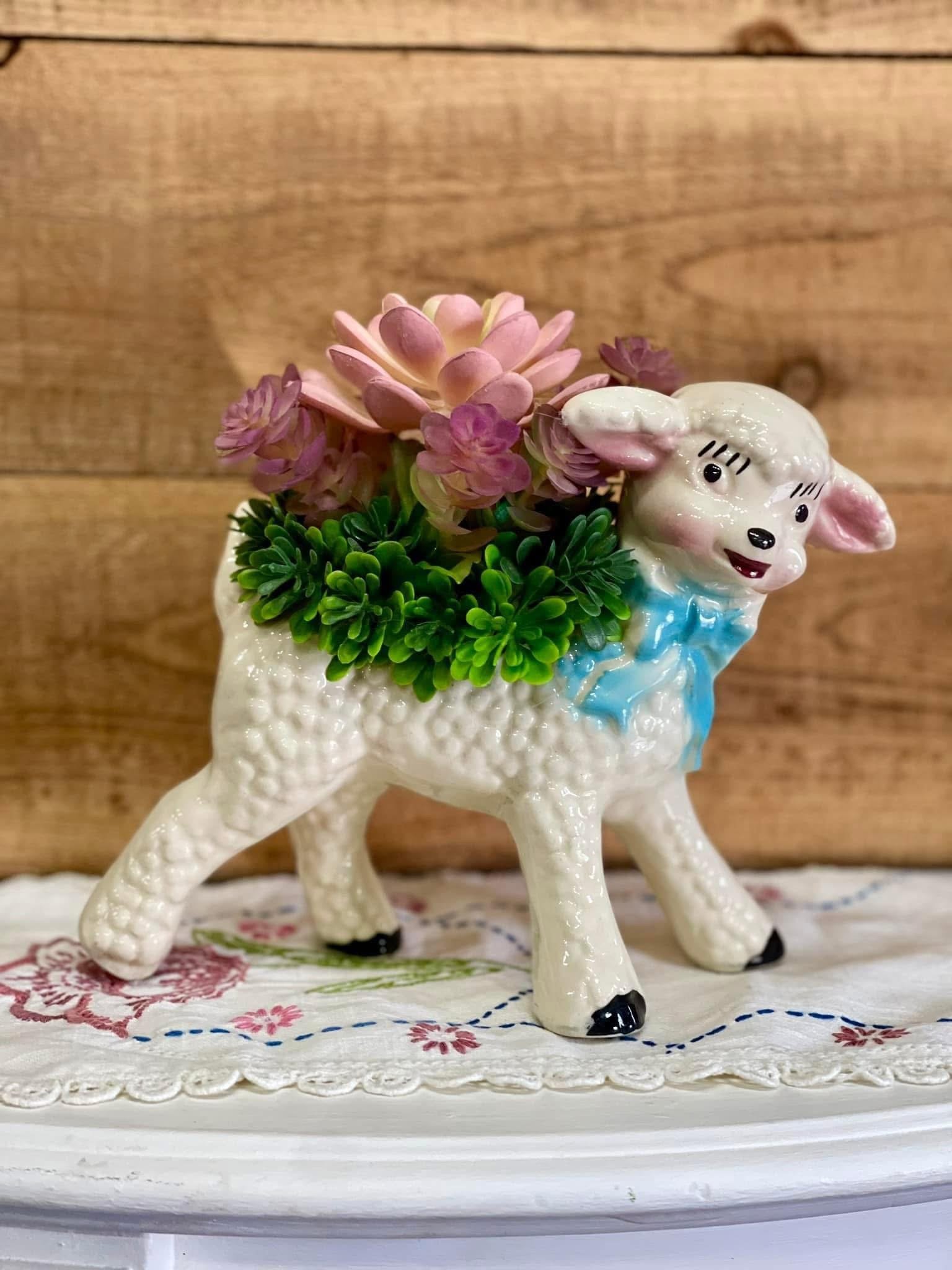 Vintage lamb planter with faux succulents