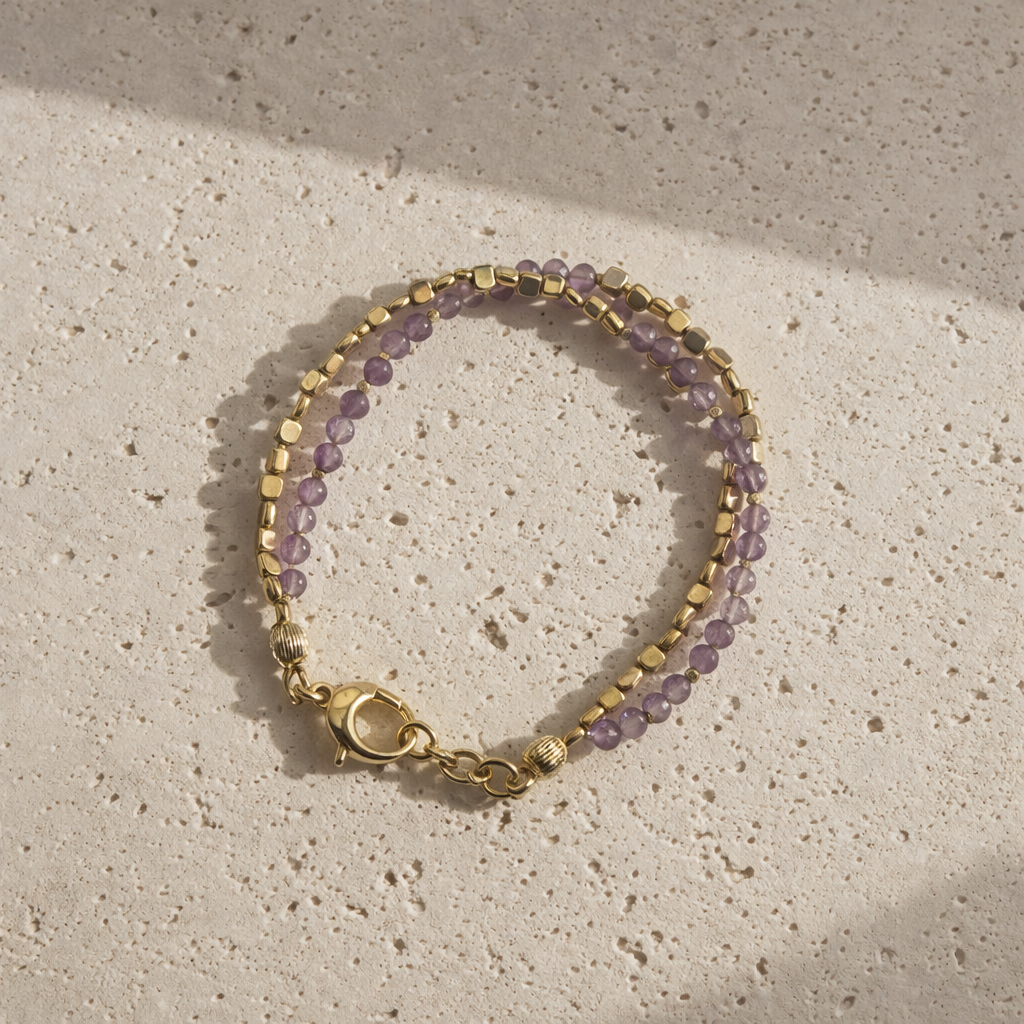 Close-up of lepidolite beads showing natural lilac variation
